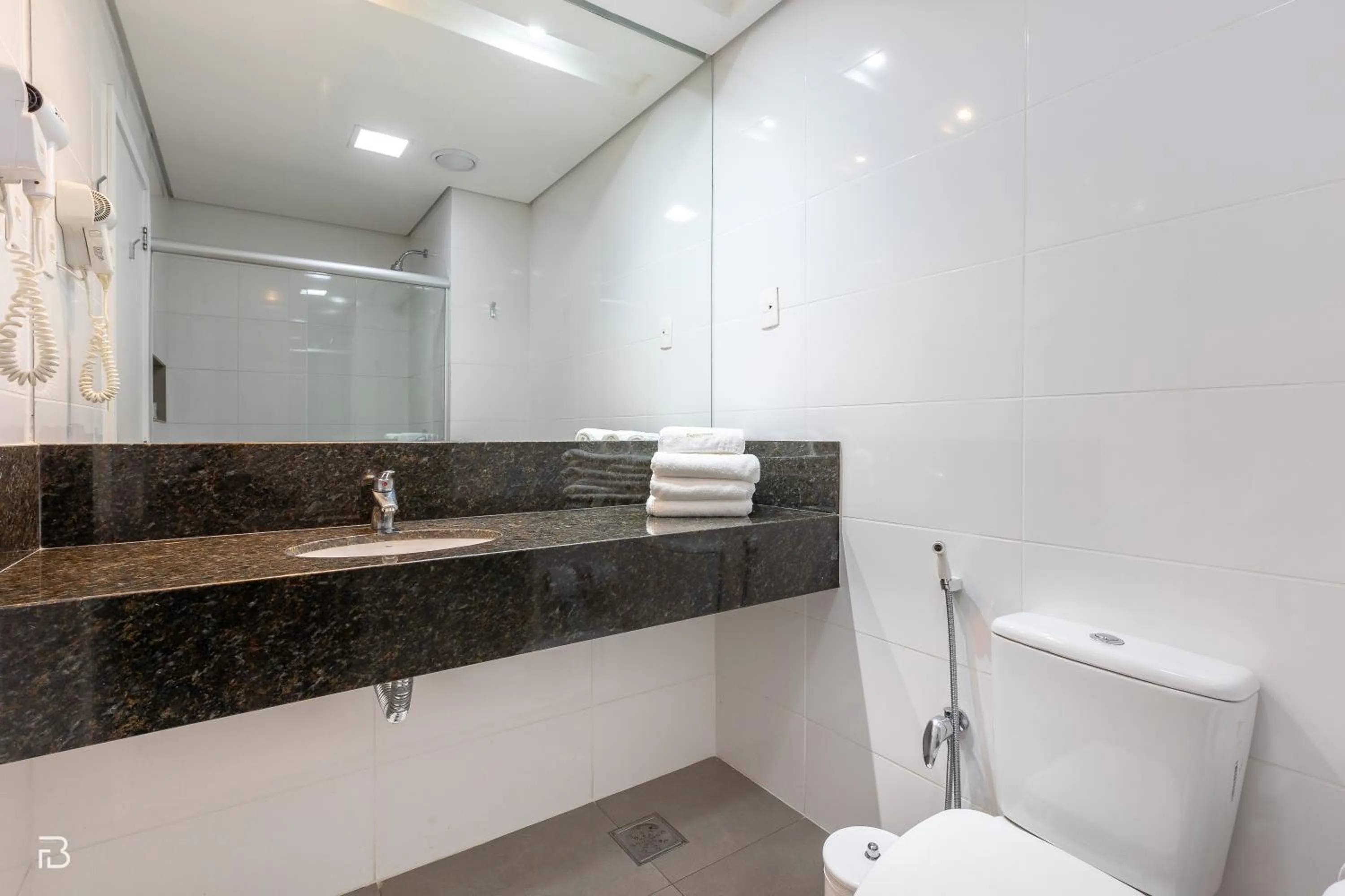 Bathroom in Gran Executive Hotel