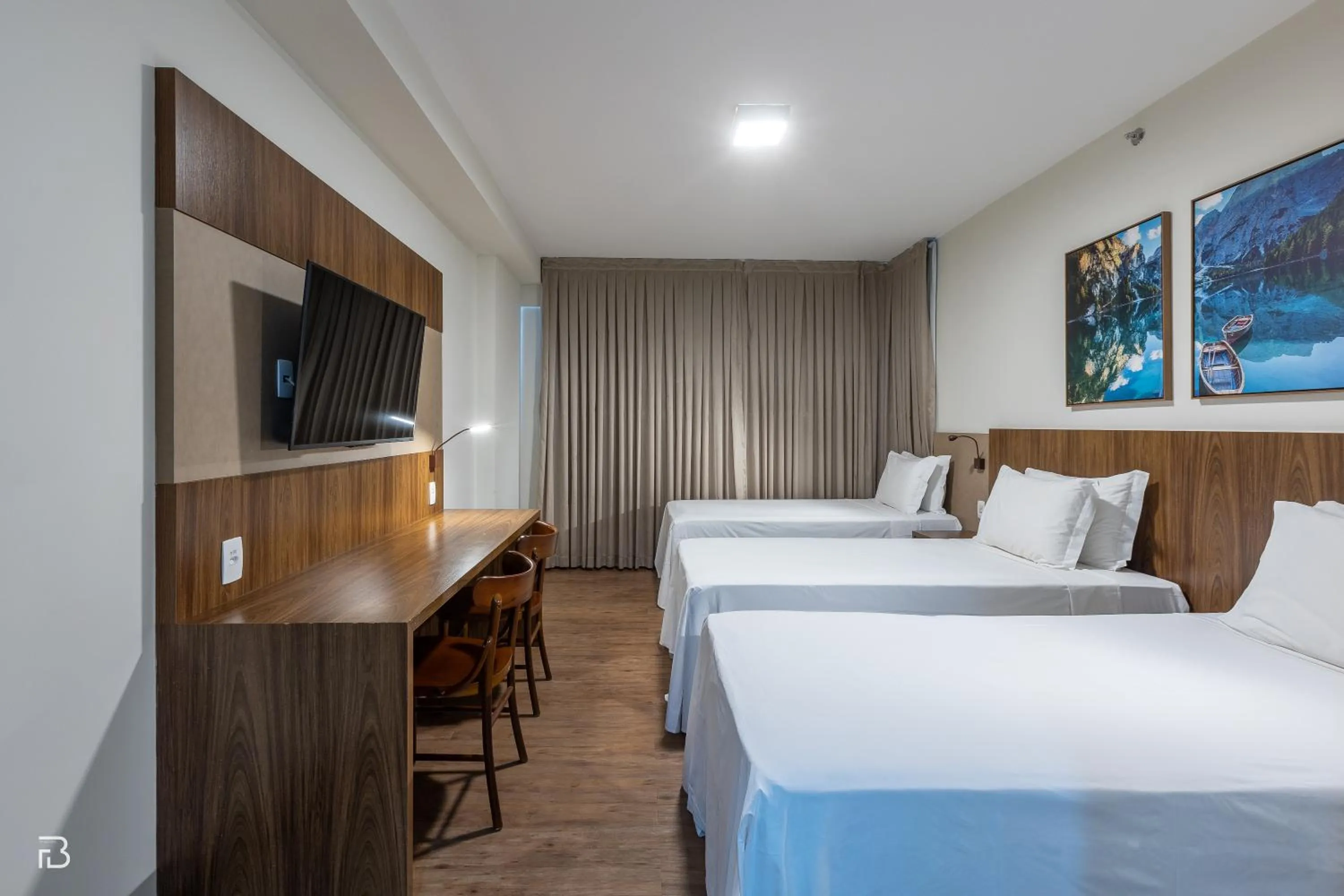 Photo of the whole room, Bed in Gran Executive Hotel