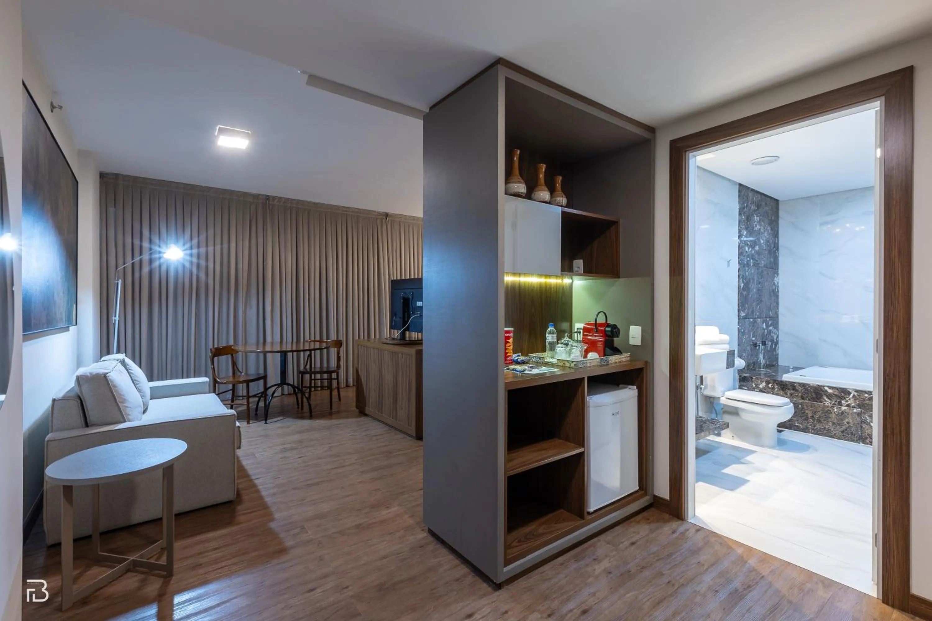 Communal lounge/ TV room in Gran Executive Hotel