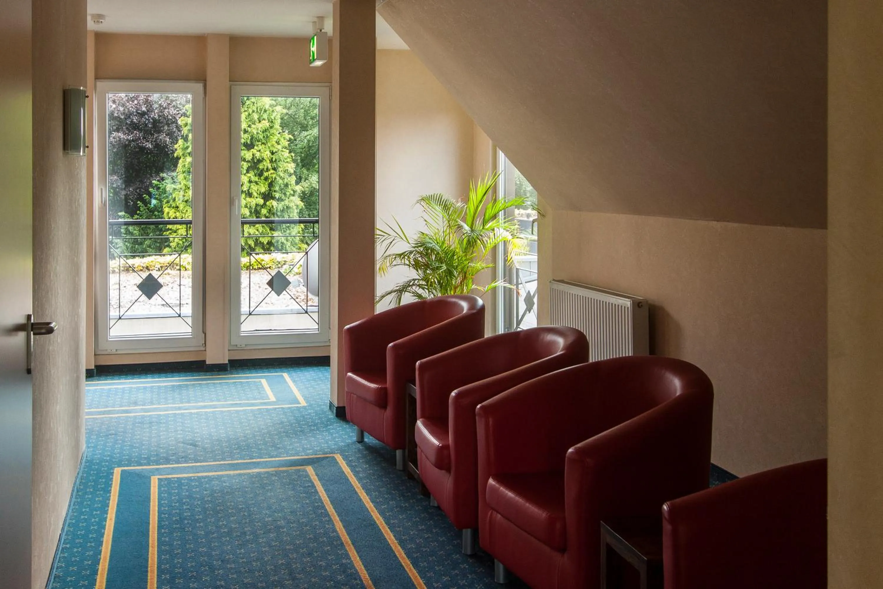 Communal lounge/ TV room in Hotel Brügge