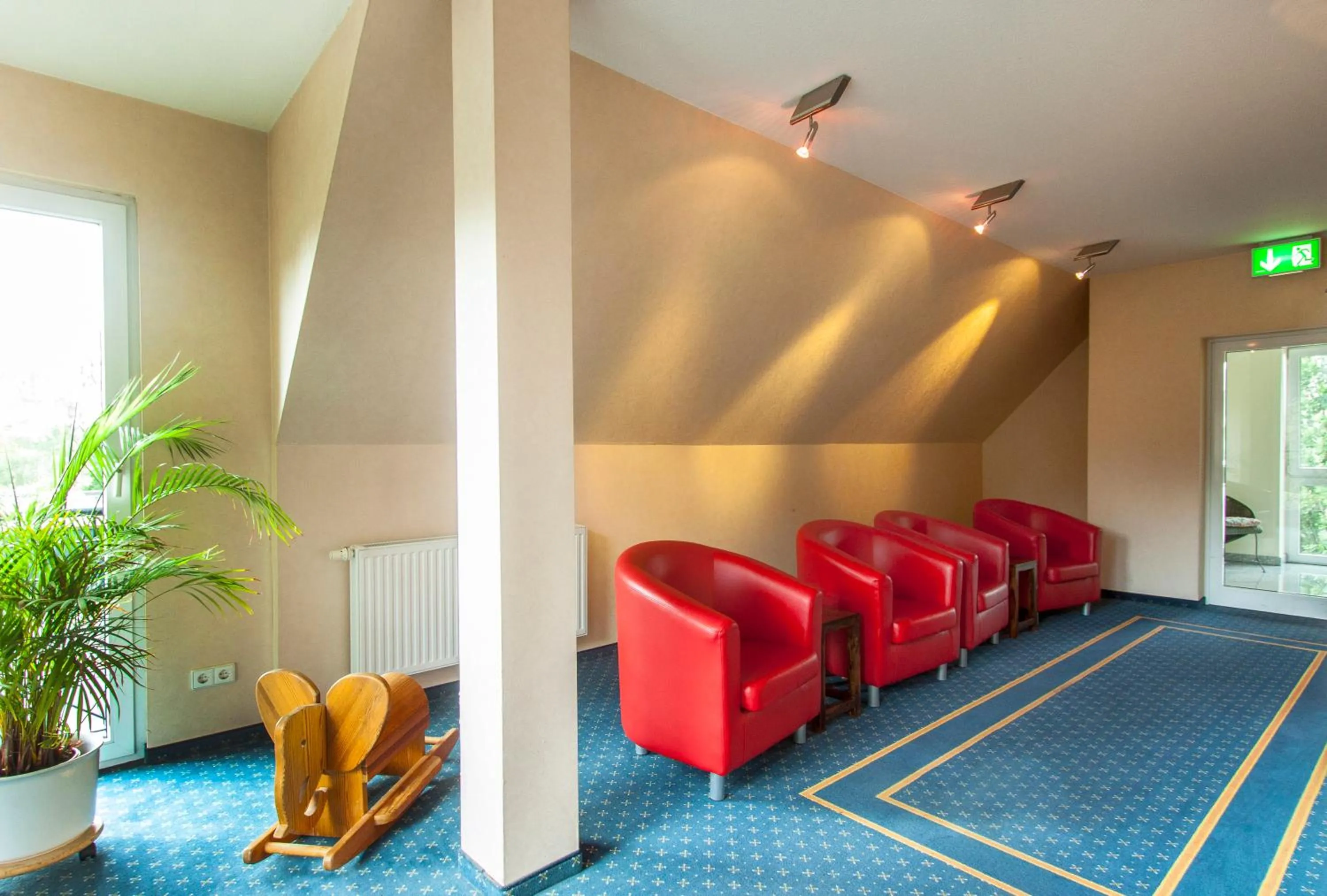 Communal lounge/ TV room in Hotel Brügge