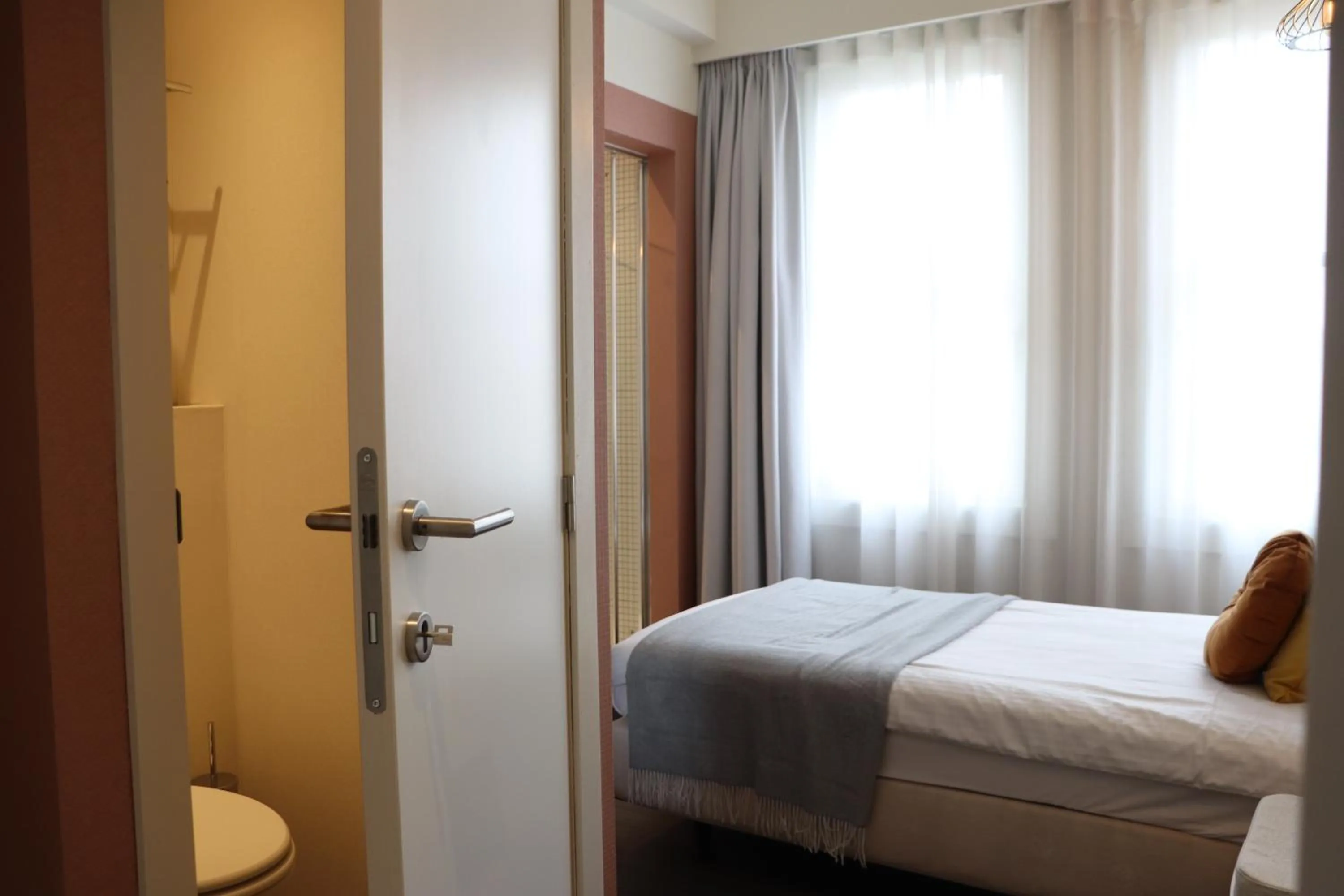 Photo of the whole room, Bed in Leopold Hotel Ostend