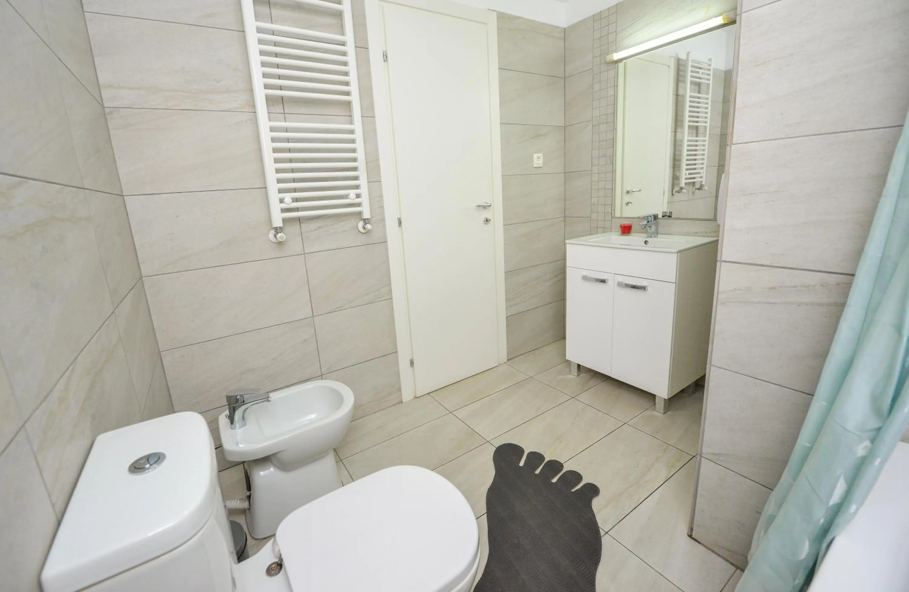 Toilet in Harmony Suites