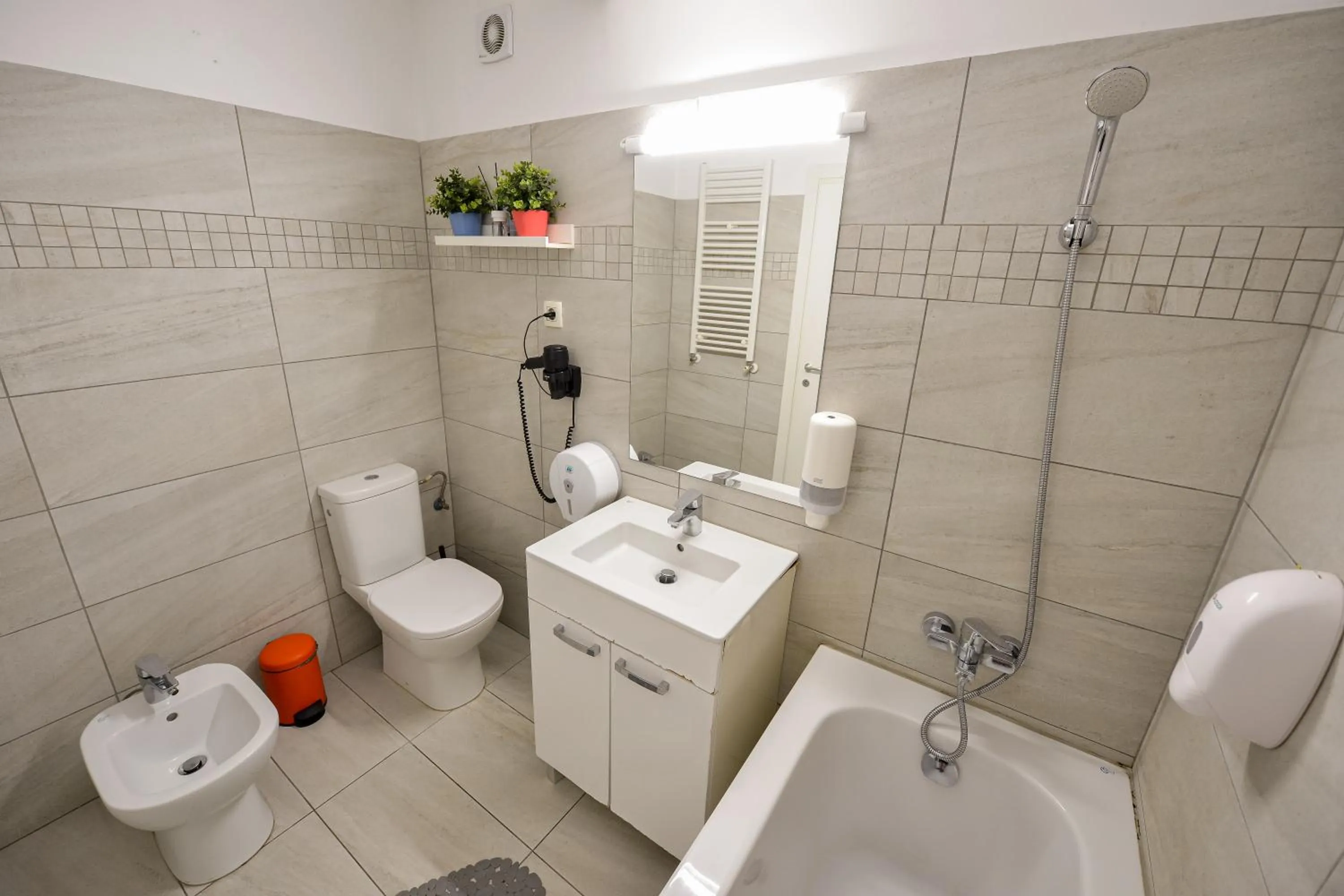 Toilet in Harmony Suites