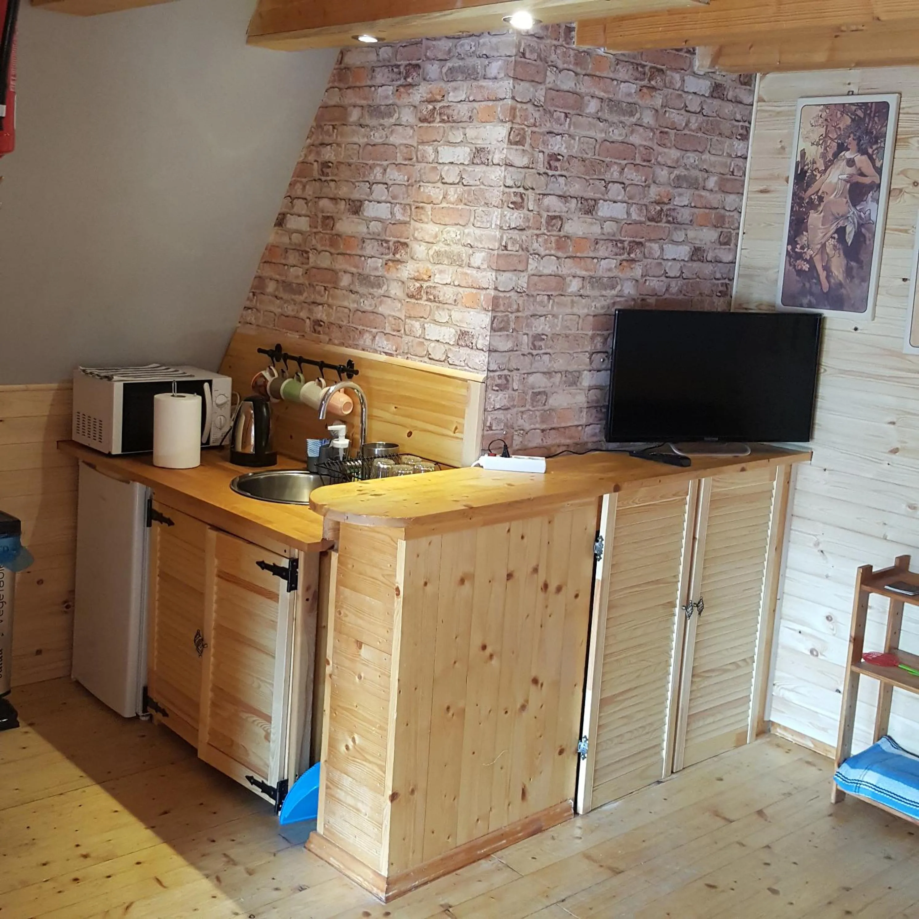 Kitchen or kitchenette in Pensjonat Gościniec Szczyrk , z sauną i jacuzzi