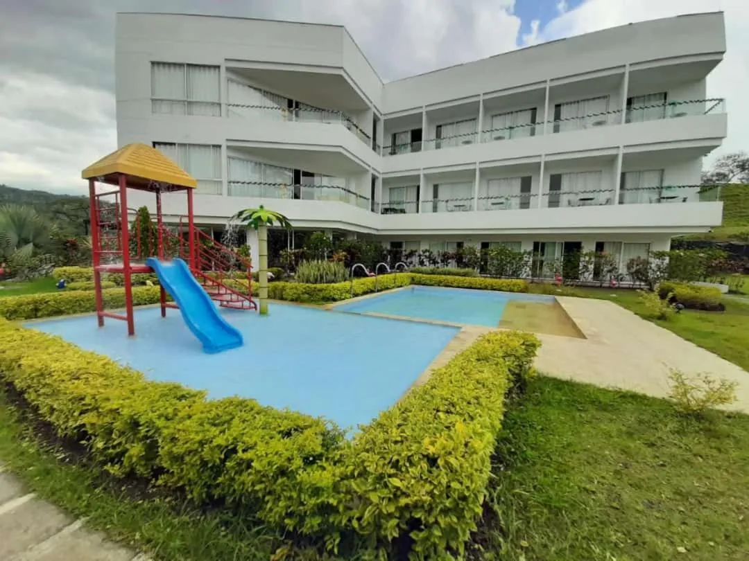 Property building in Hotel Palmeras De Luz