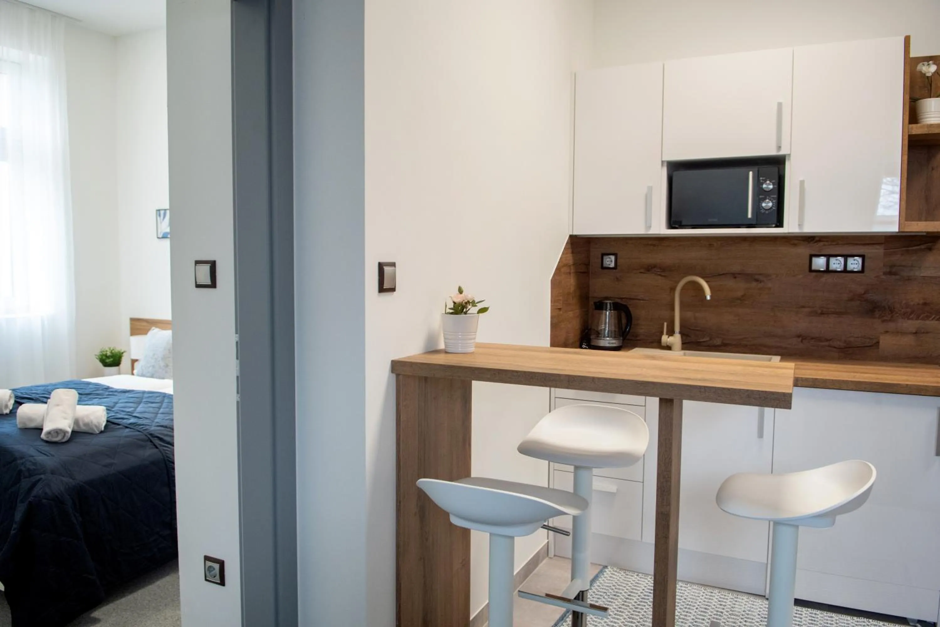 Kitchen or kitchenette, Bed in Hotel Dolce Vita