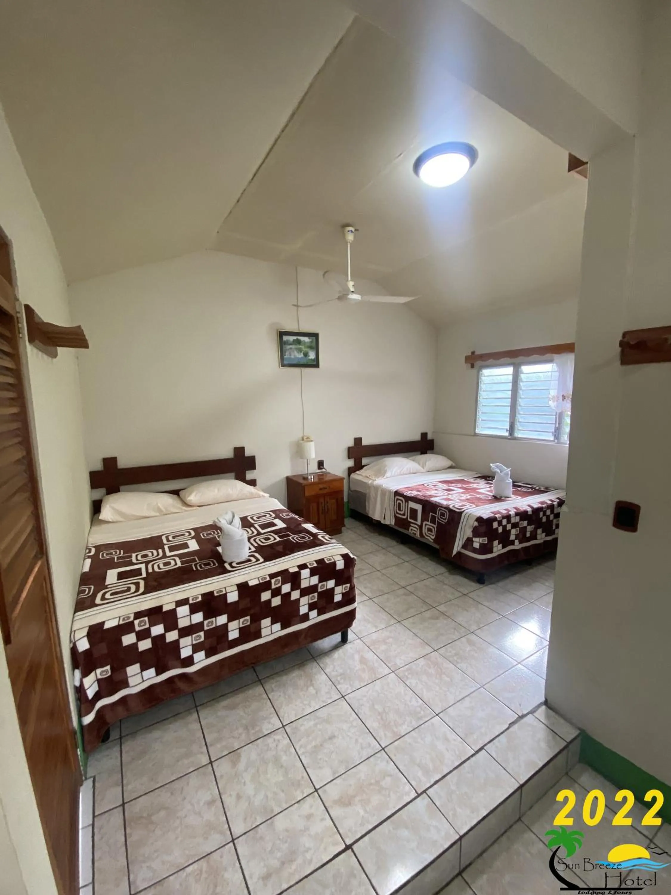 Photo of the whole room, Bed in Sun Breeze Hotel