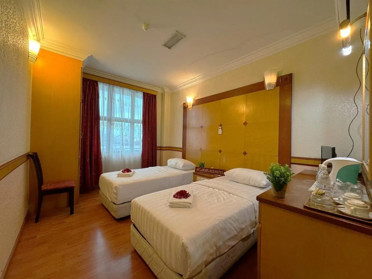 Bed in Flora Place Hotel