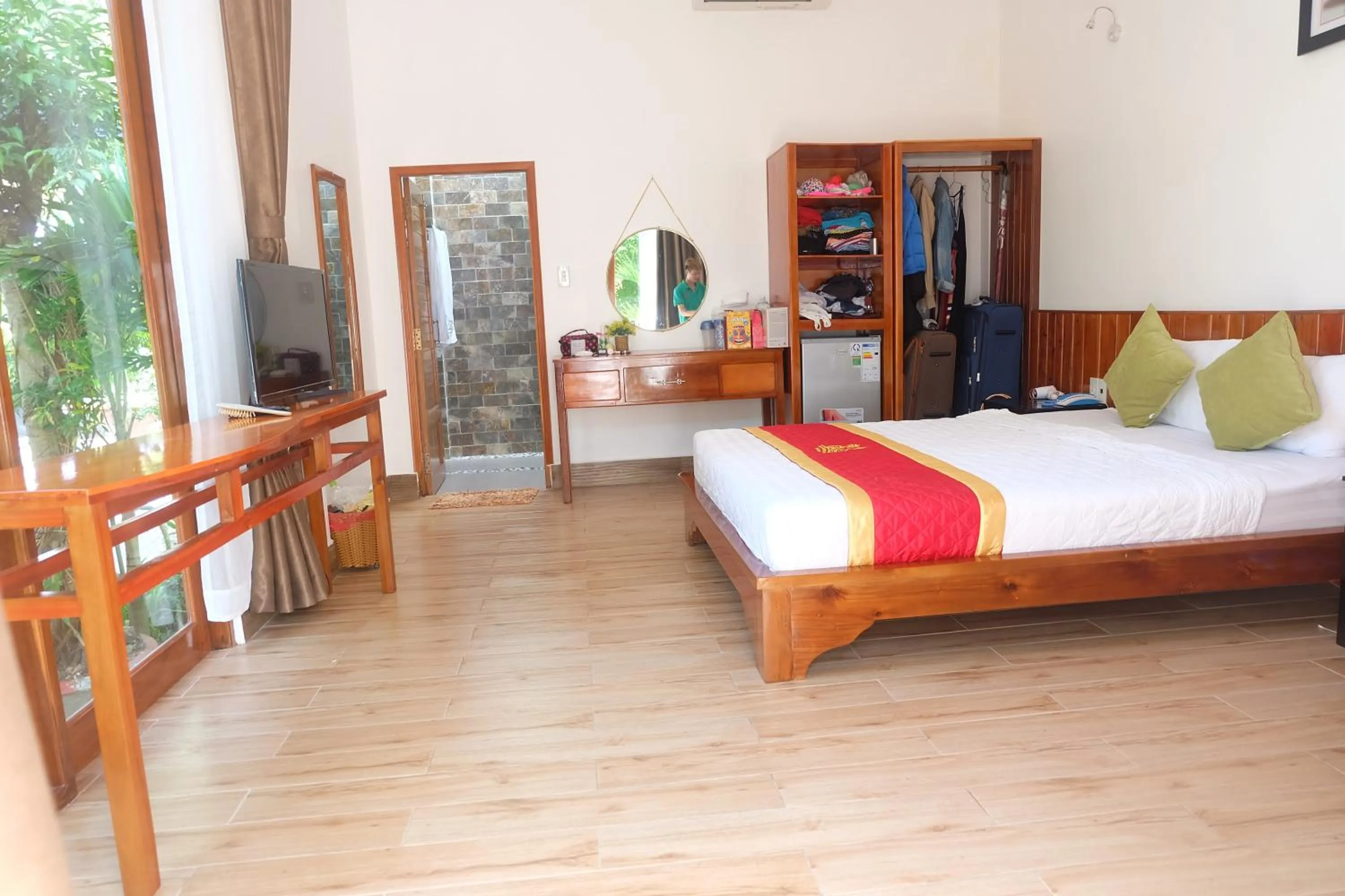 Communal lounge/ TV room, Bed in Mai Binh Phuong Bungalow