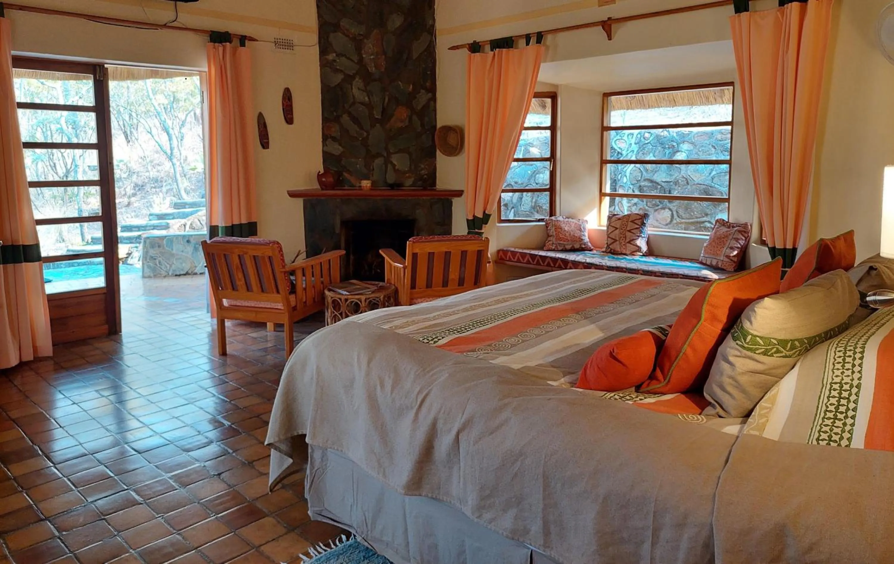 Seating area, Bed in Musangano Lodge