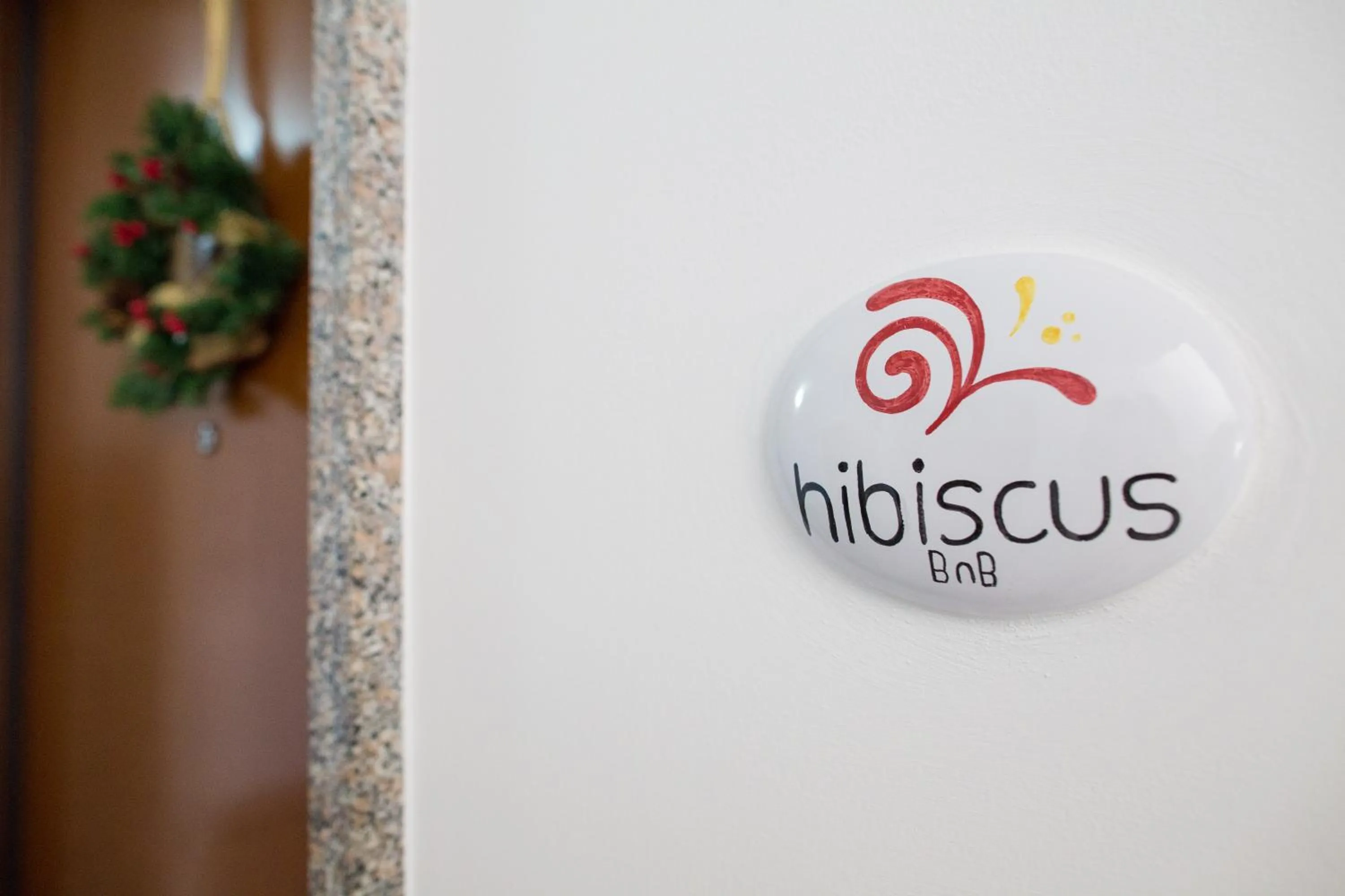 Property logo or sign in Hibiscus