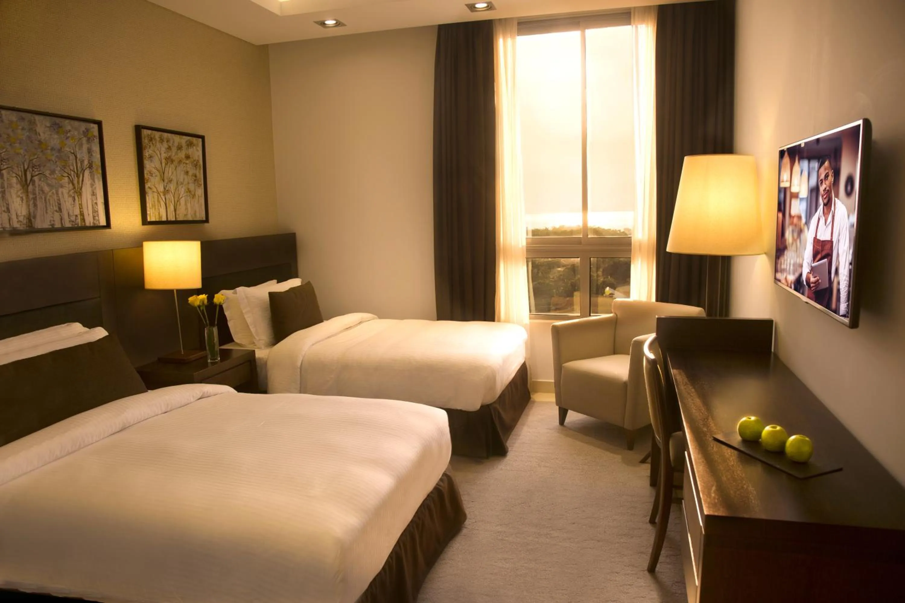 Bed in Kin Plaza Arjaan by Rotana