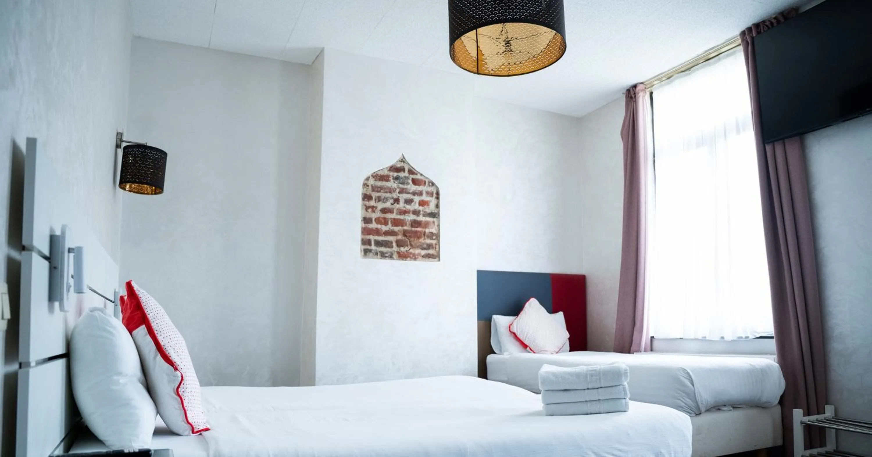 Bed in Hotel Le Centenaire Brussels Expo