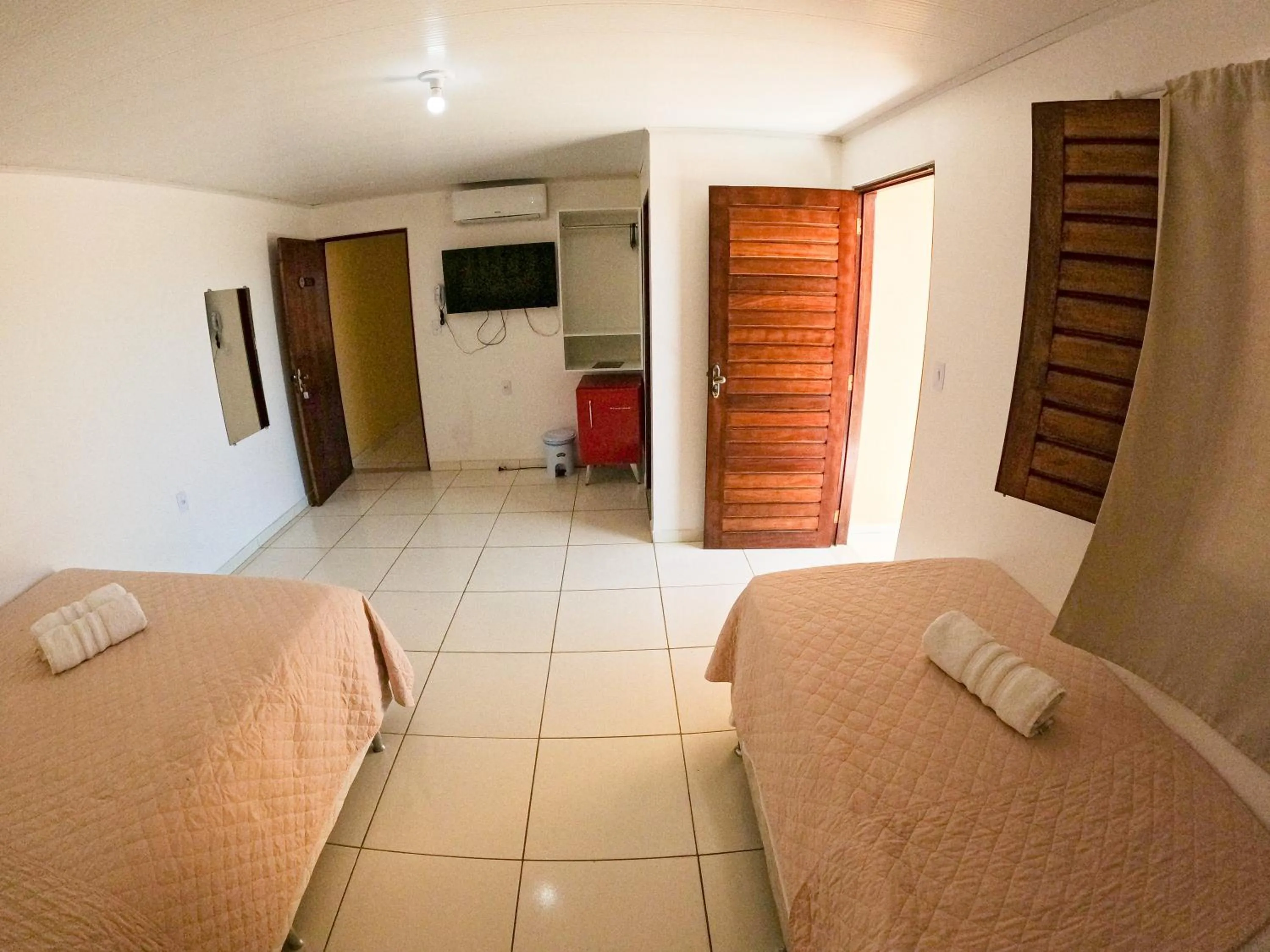 Bed in Pousada Paris