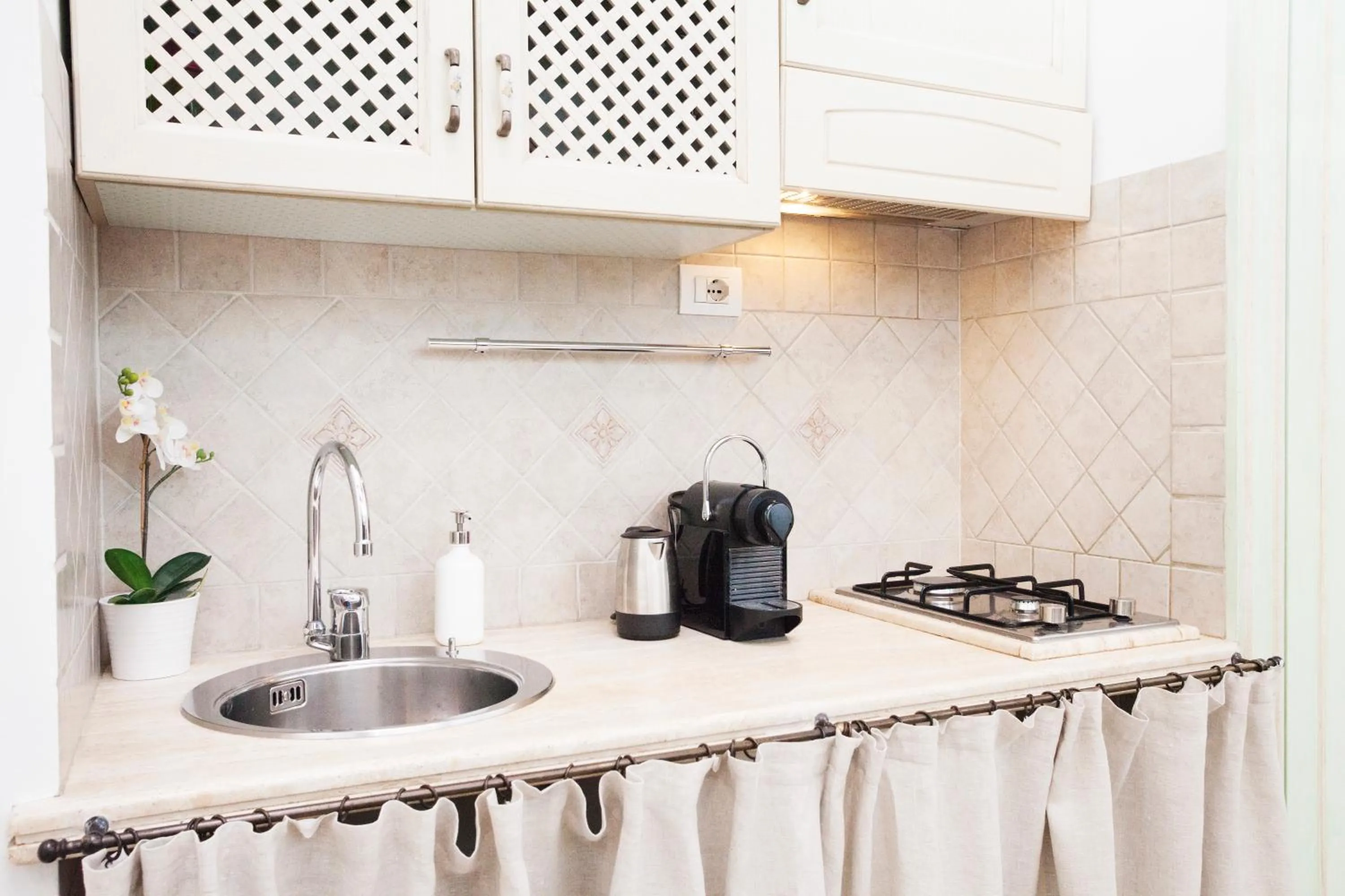 Kitchen or kitchenette in Tritone 91 Apartments