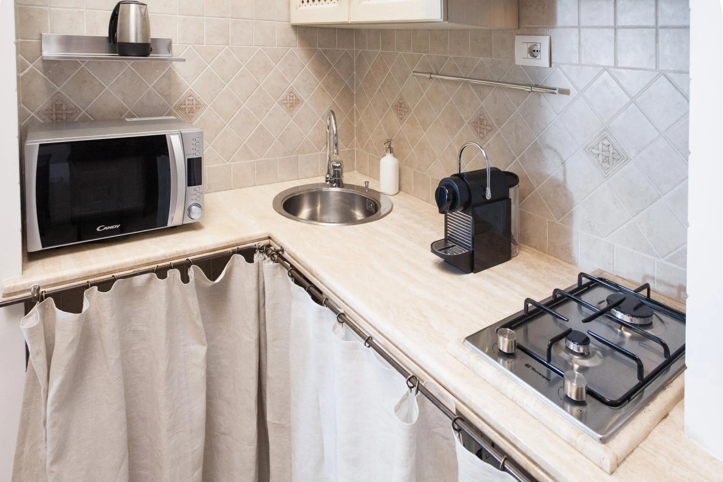 Kitchen or kitchenette in Tritone 91 Apartments