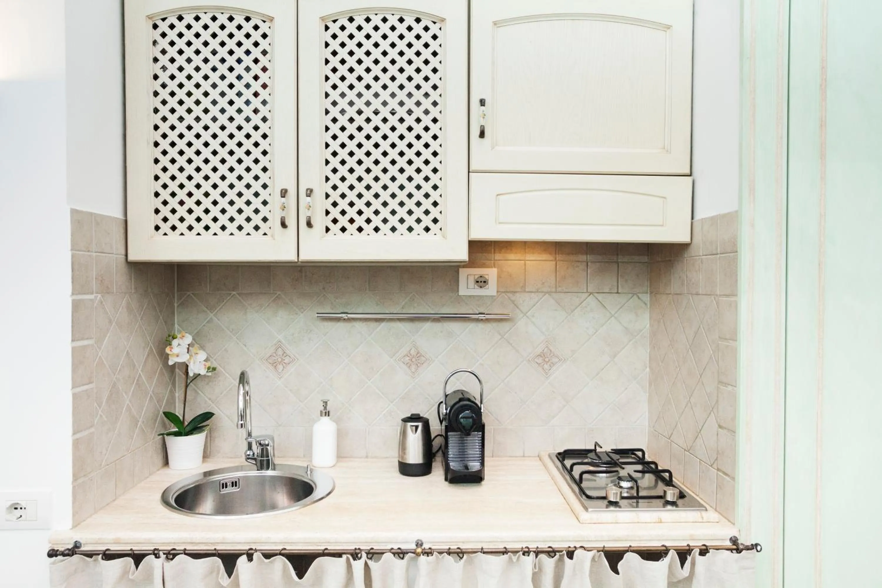 Kitchen or kitchenette in Tritone 91 Apartments