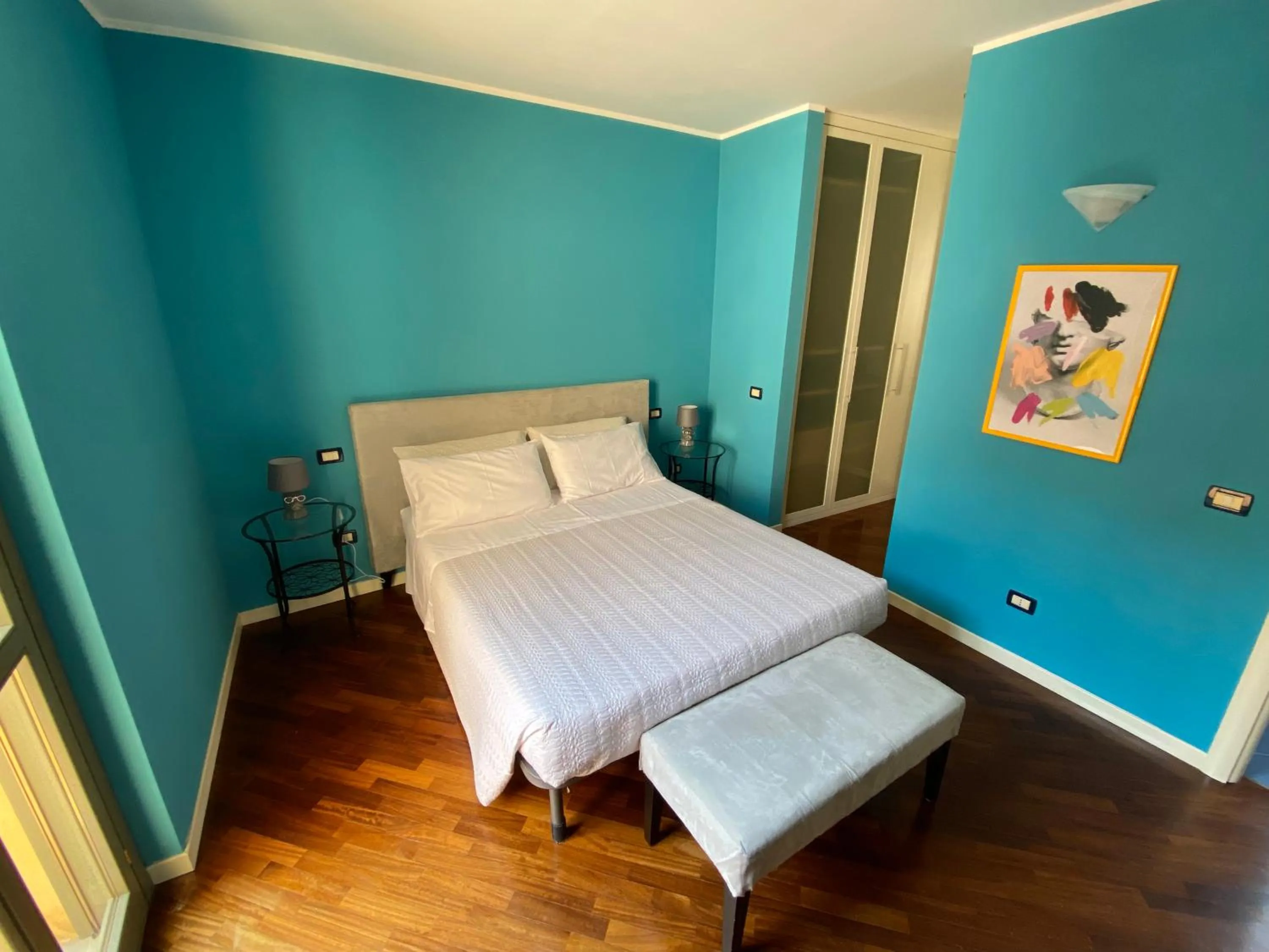 Bed in Amici Miei Rooms