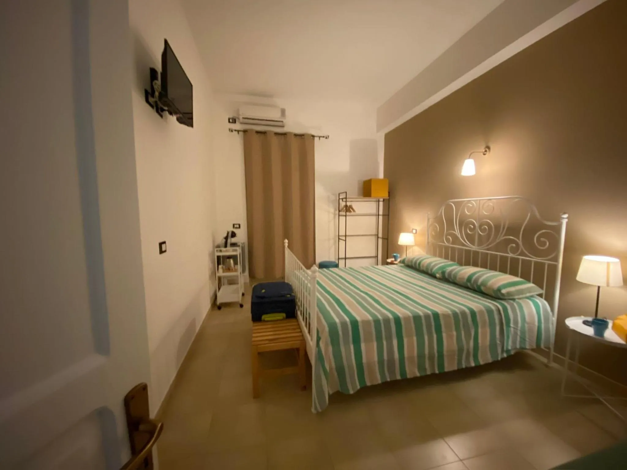 Bed in Bellassai Rooms