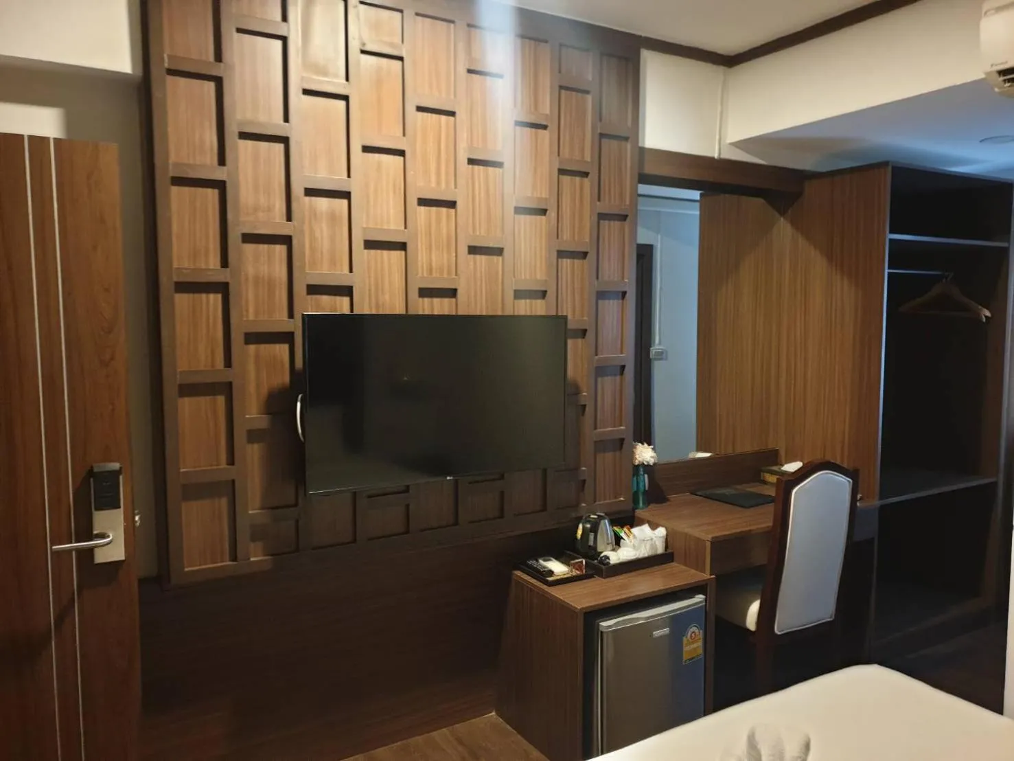 Bedroom in The Wing Lanna Hotel