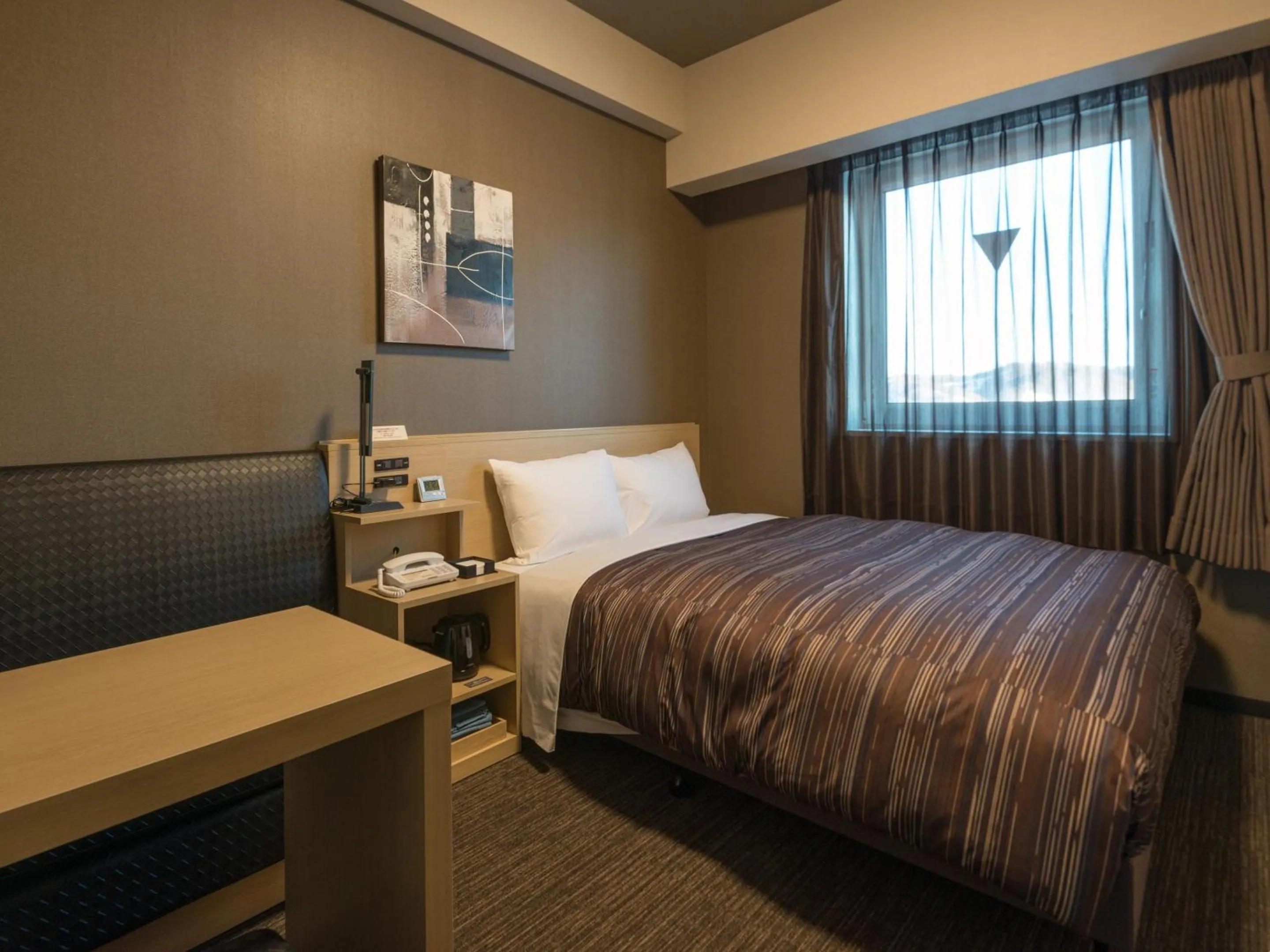 Photo of the whole room, Bed in Hotel Route Inn Grand Kitami Ekimae