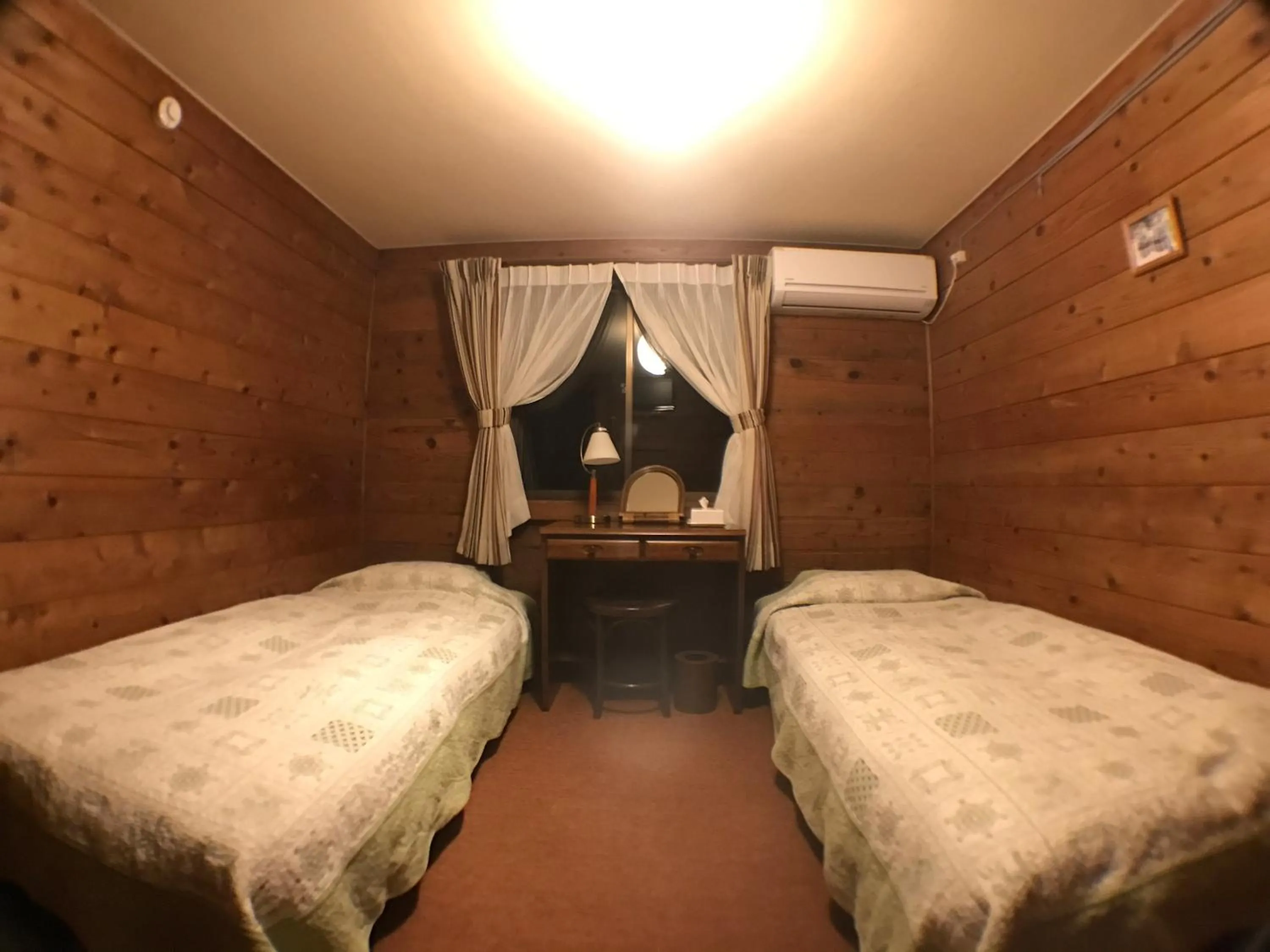 Bed in Pension Sanrinsha