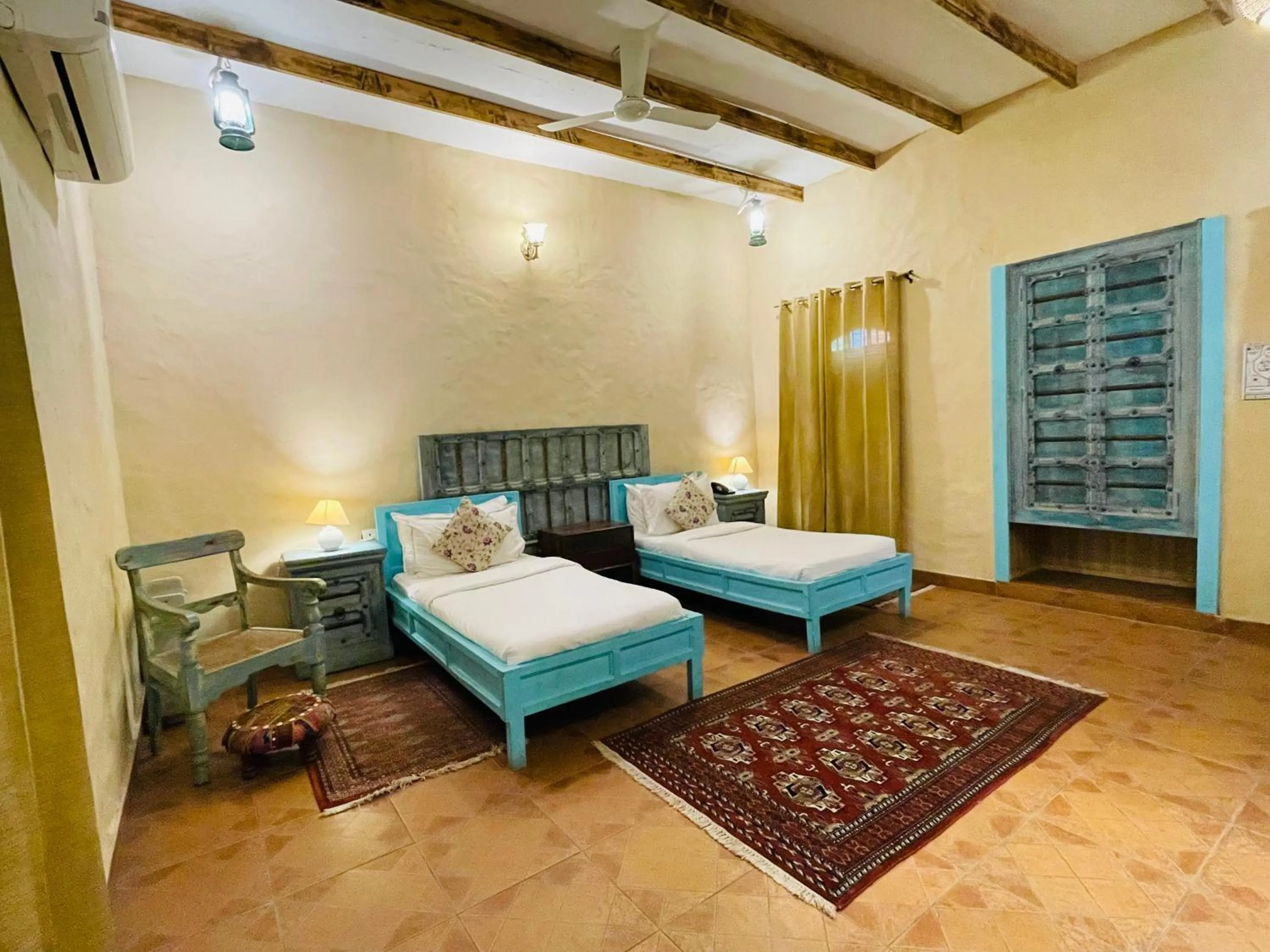 Bed in WelcomHeritage Ranjitvilas