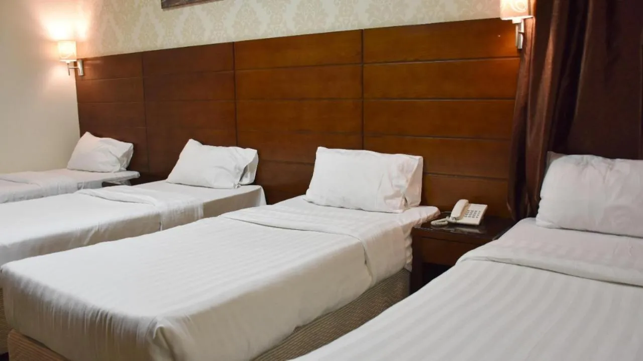 Bed in Mirage Al Salam Hotel