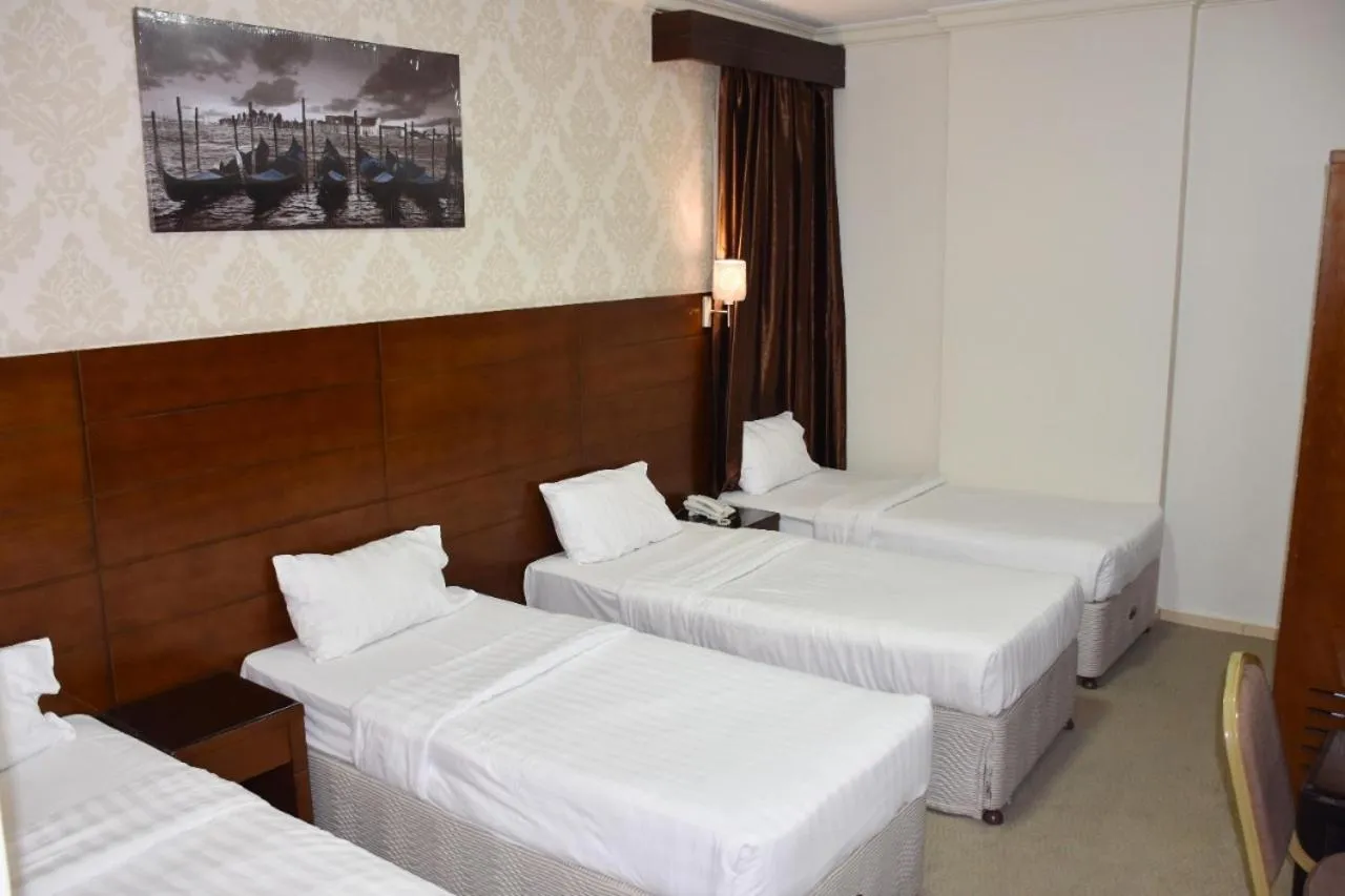 Bed in Mirage Al Salam Hotel