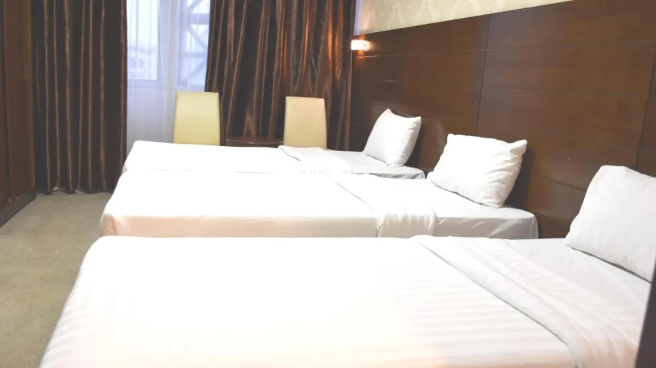 Bed in Mirage Al Salam Hotel