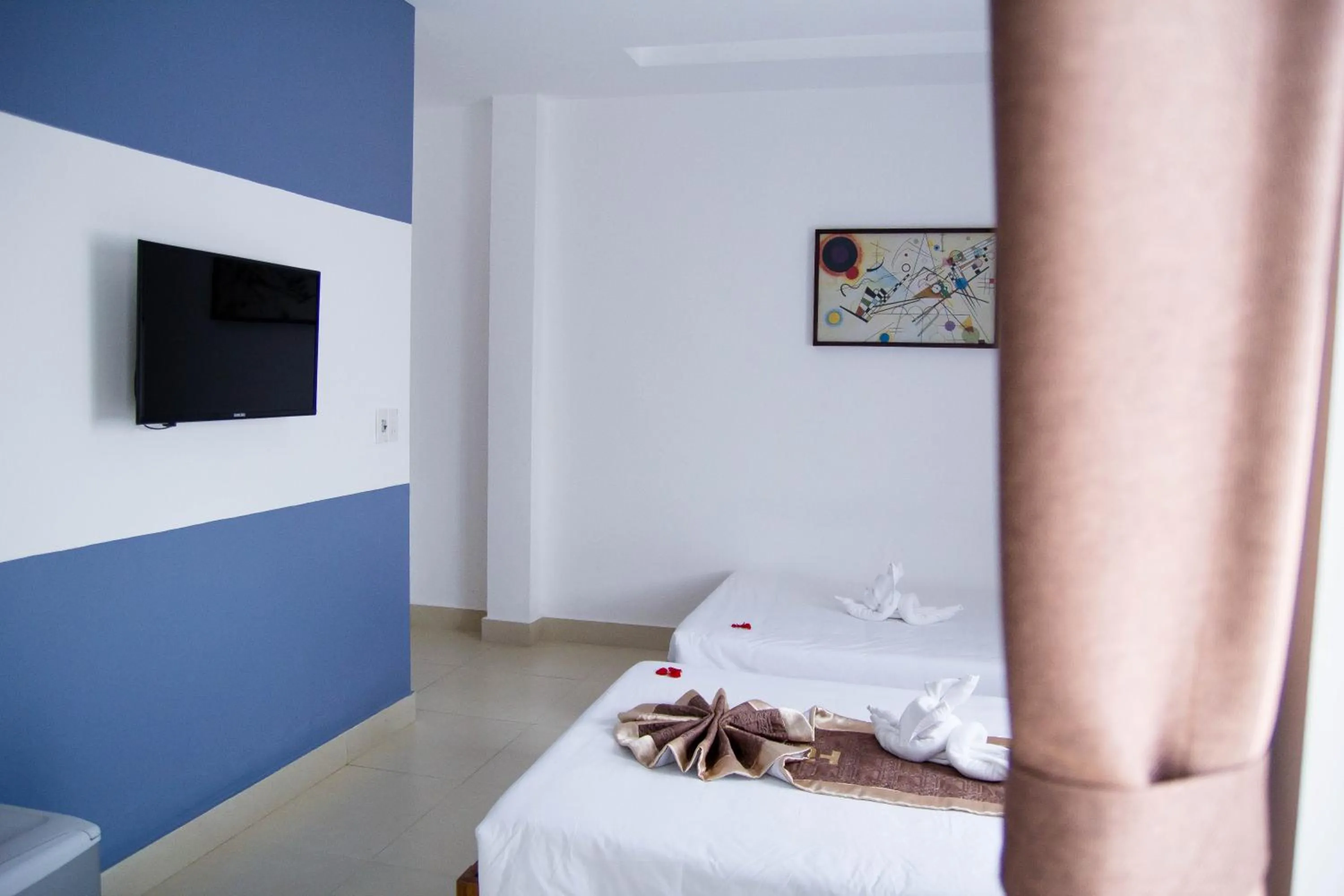 Bed in Poetic Hue Hotel & Spa