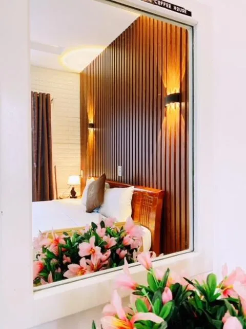 Bed in Poetic Hue Hotel & Spa