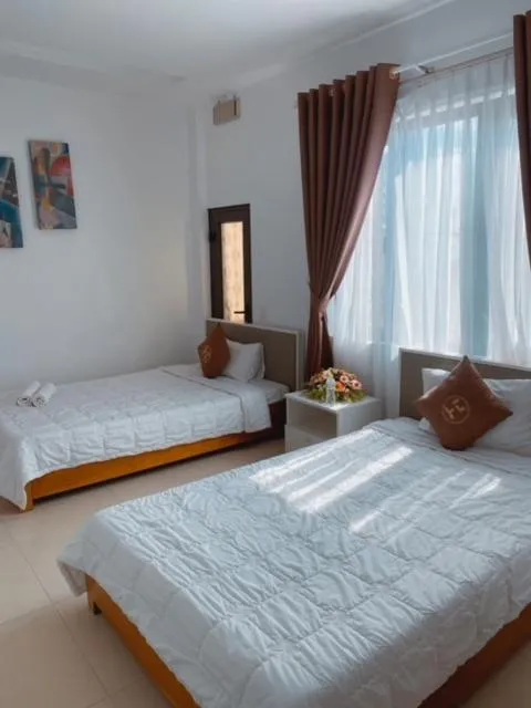 Bed in Poetic Hue Hotel & Spa