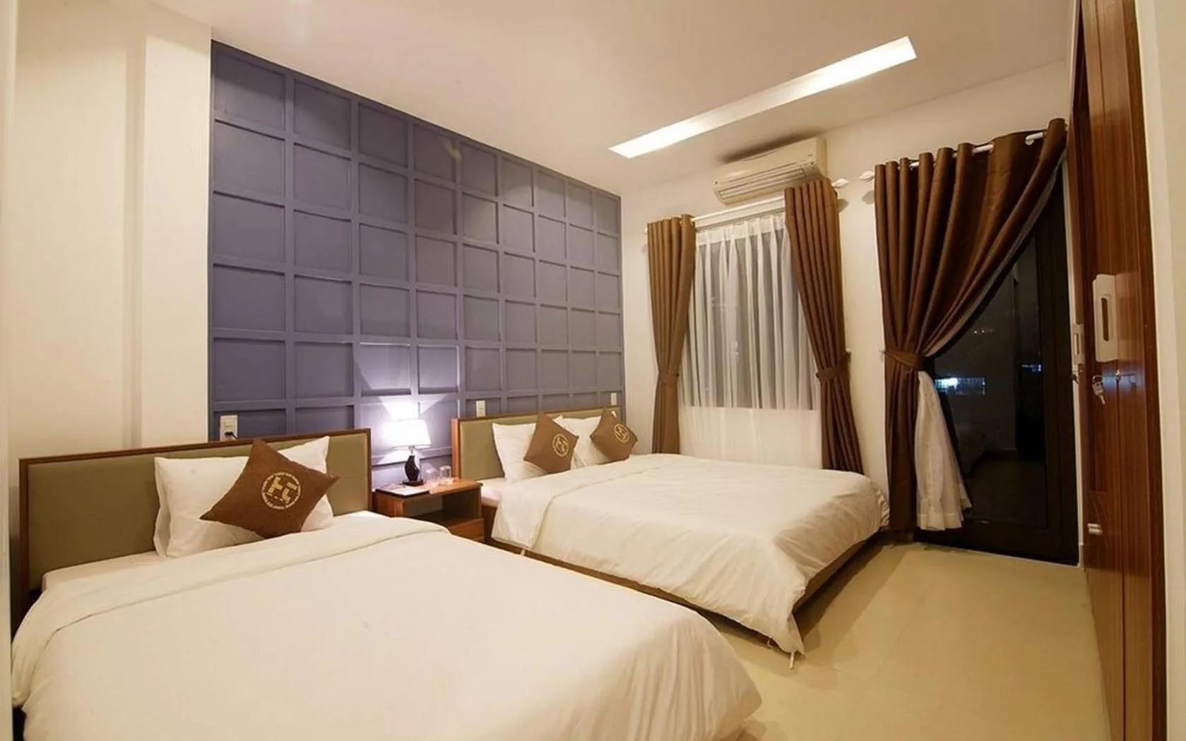Bed in Poetic Hue Hotel & Spa