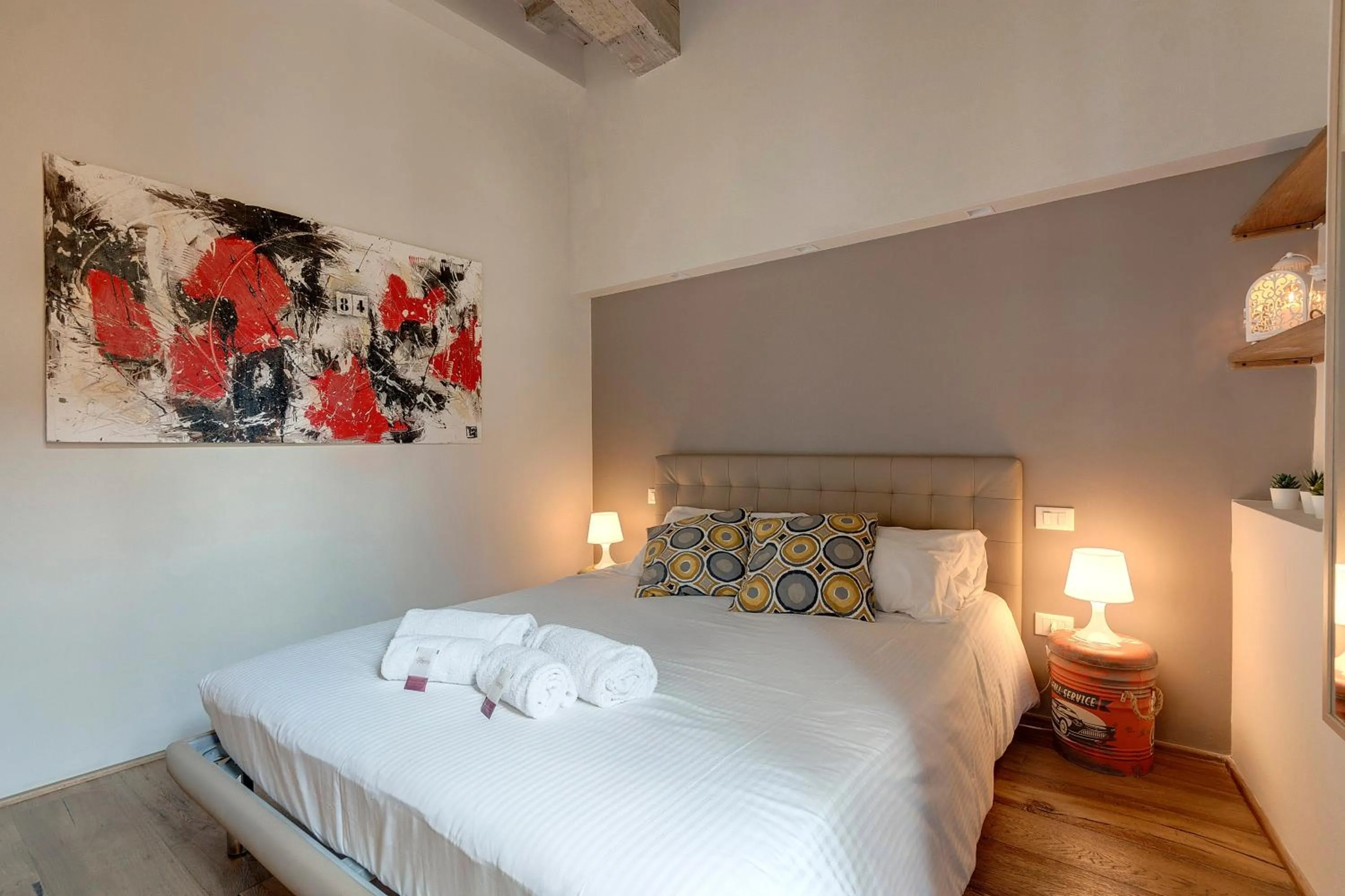 Bed in Boheme Apartment by Mamo Florence