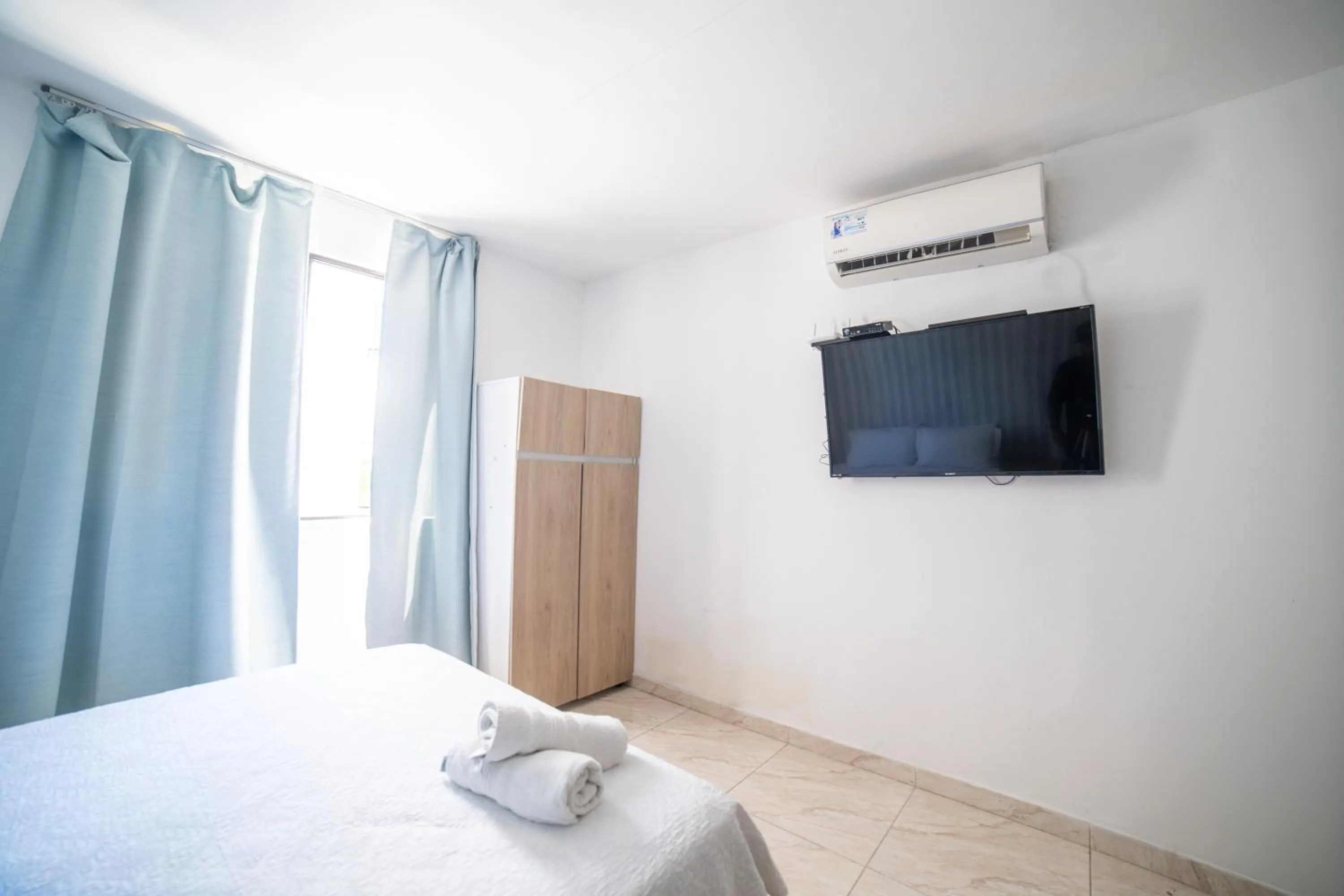 Bed in ZOJO MARiNA BAY