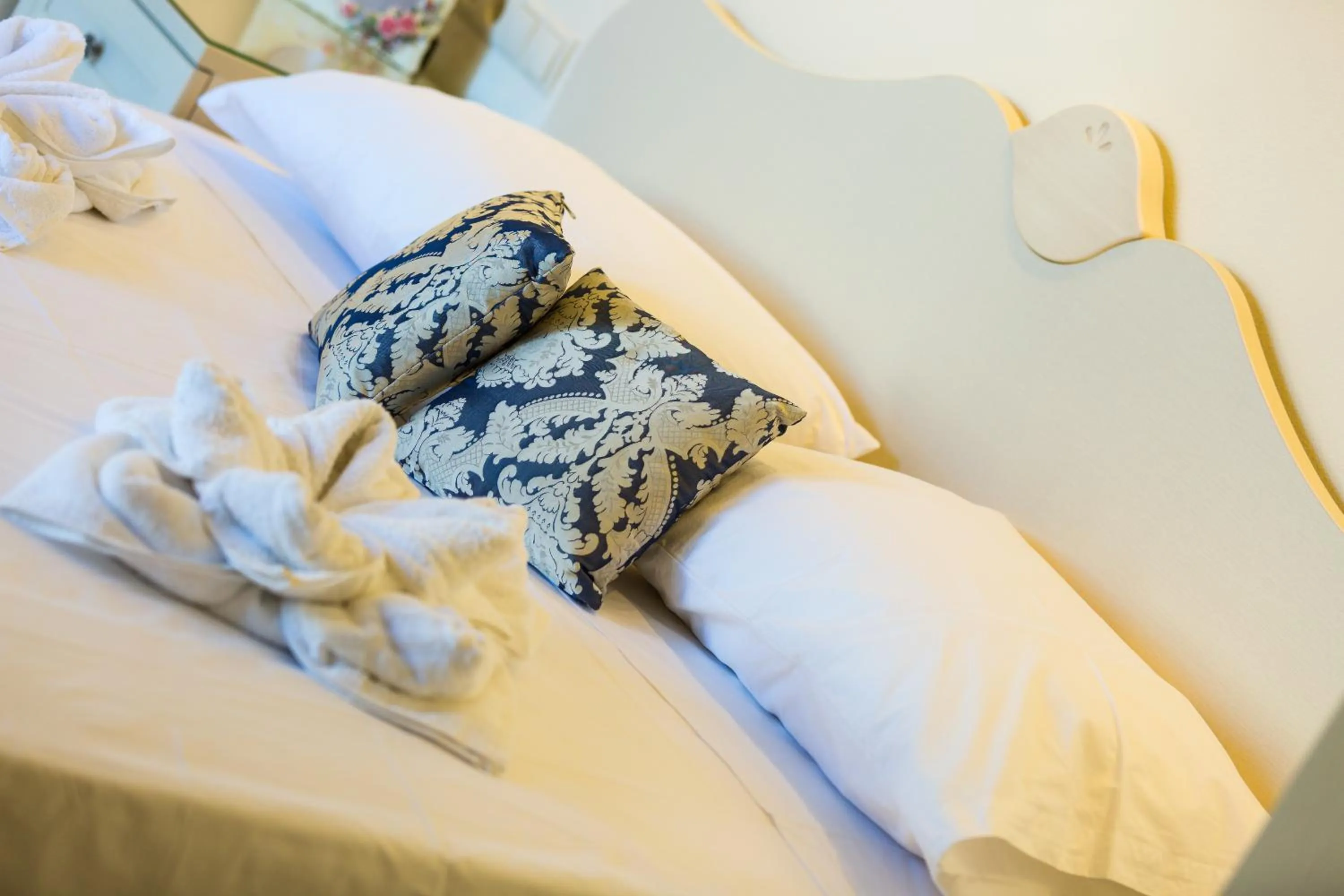 Bed in Polyxenia Suites