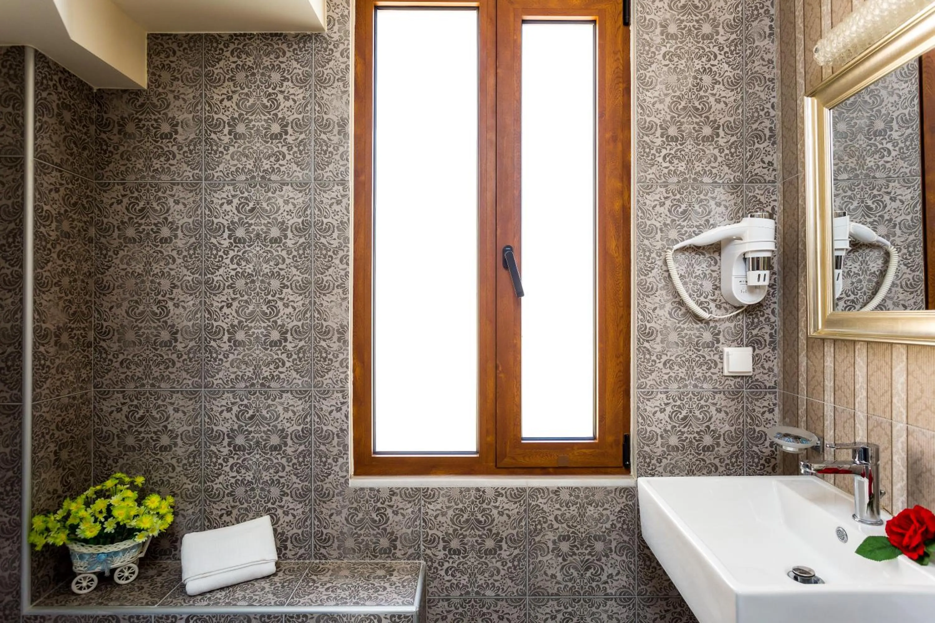 Toilet in Polyxenia Suites