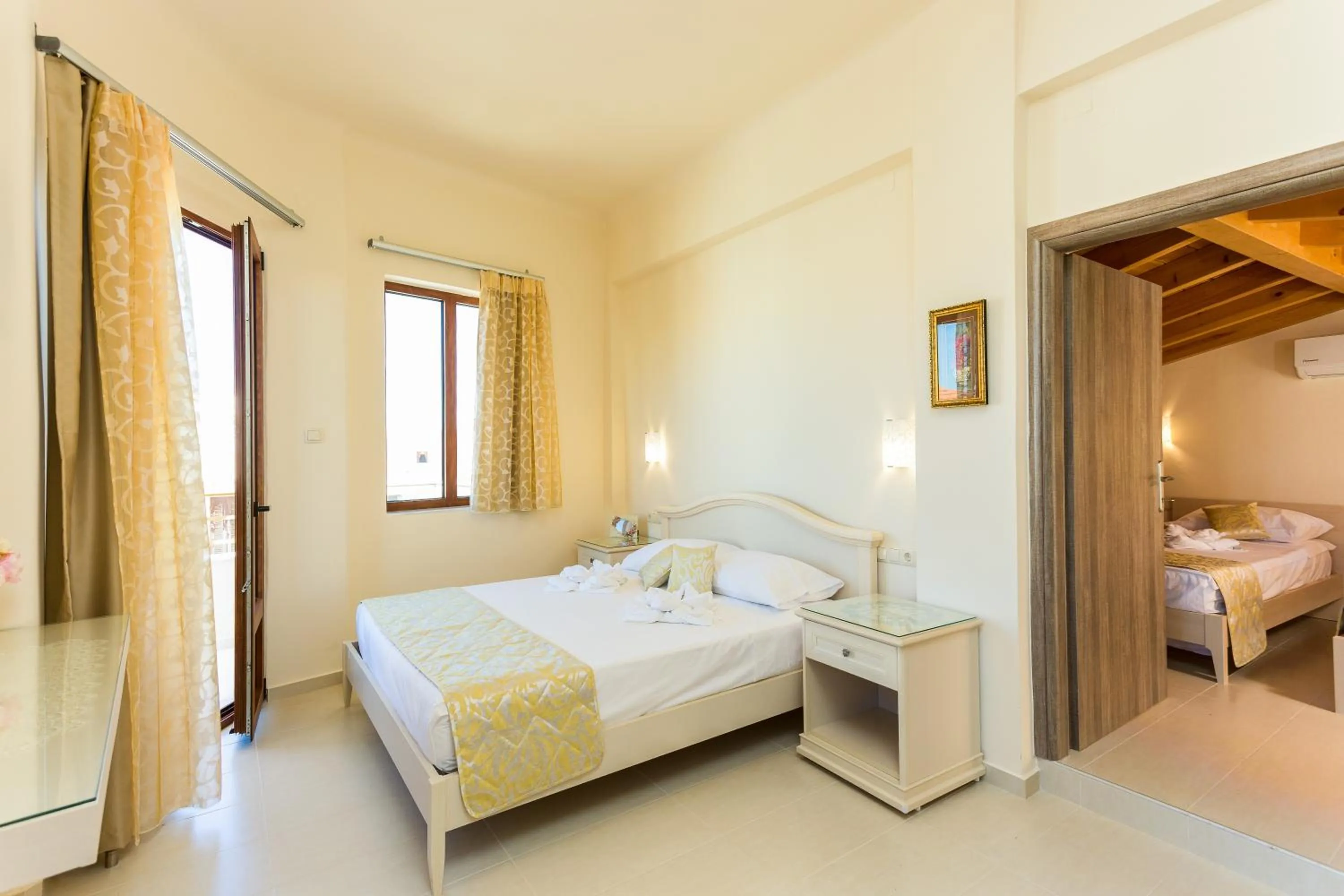 Bed in Polyxenia Suites