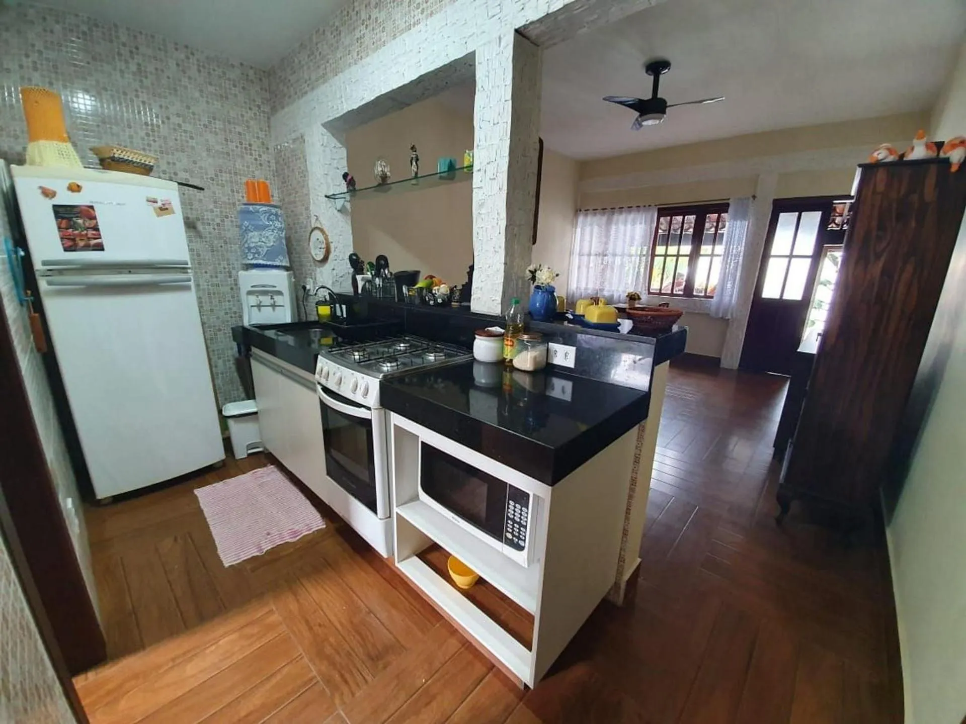 Kitchen or kitchenette in Apart Hotel Pet Friendly em Búzios