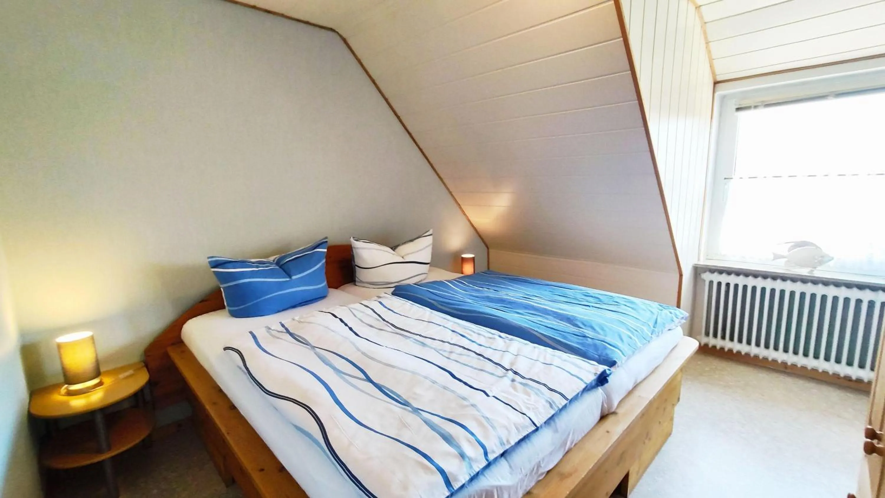 Bed in Gaestehaus-Zur-alten-Post-Wohnung-Nord