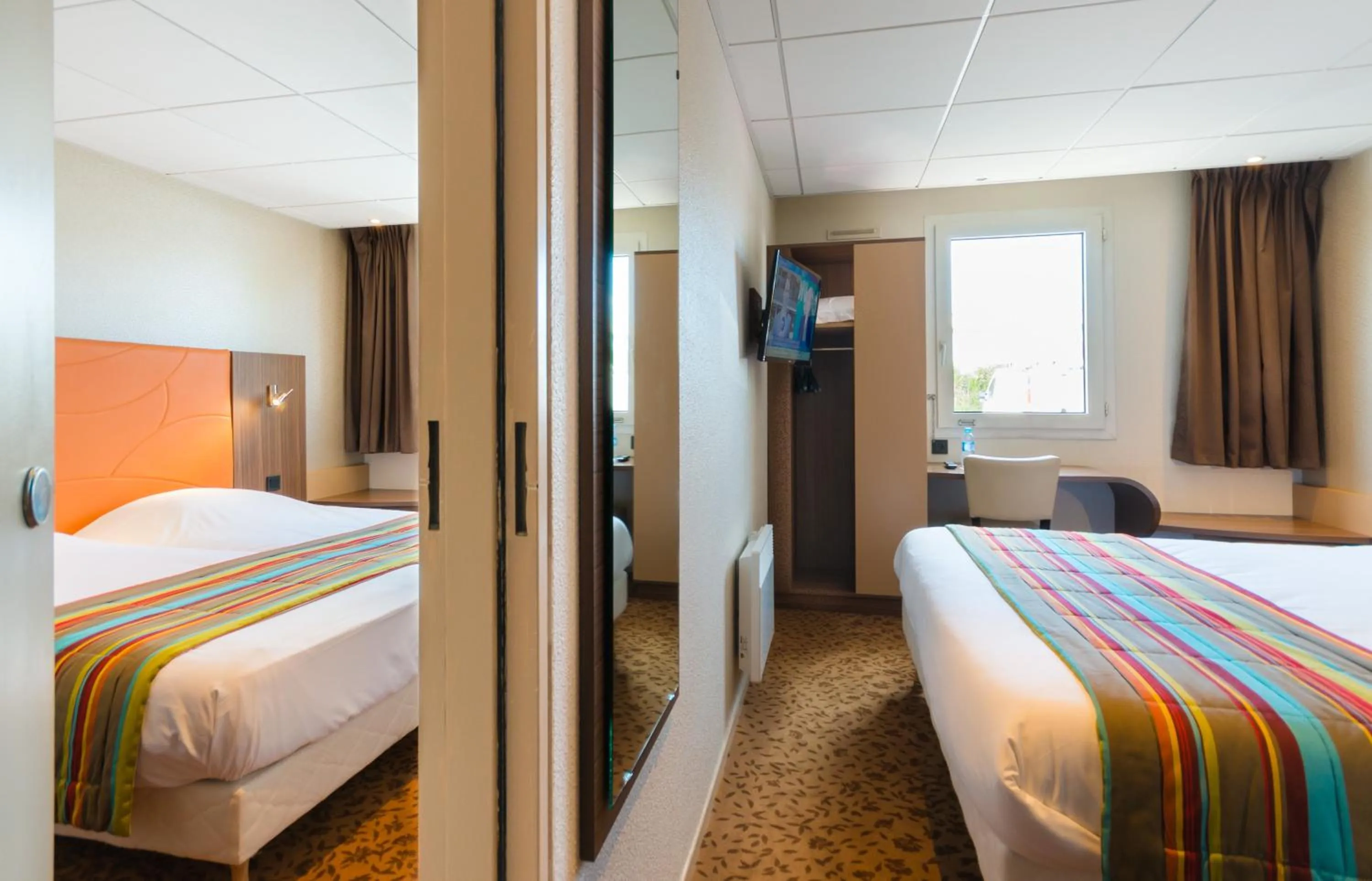 Photo of the whole room, Bed in Brit Hotel Le Kerann Nantes St Herblain - Zac De La Lorie