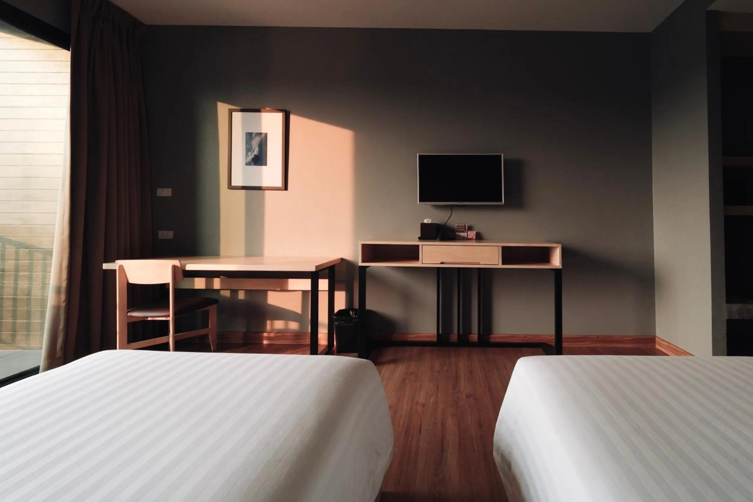 Bed in Riverawan Hotel