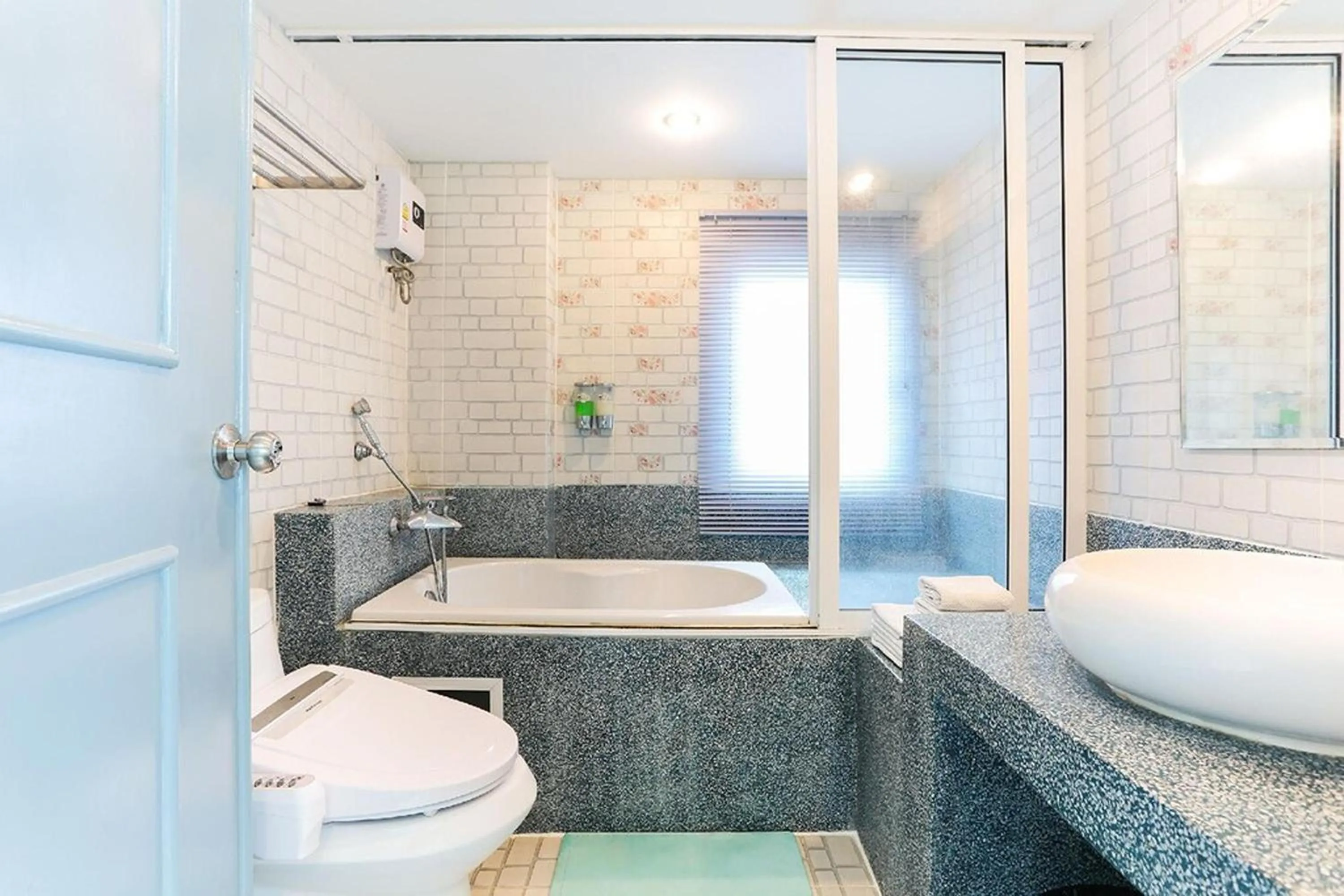 Bedroom in The Lilly Hotel