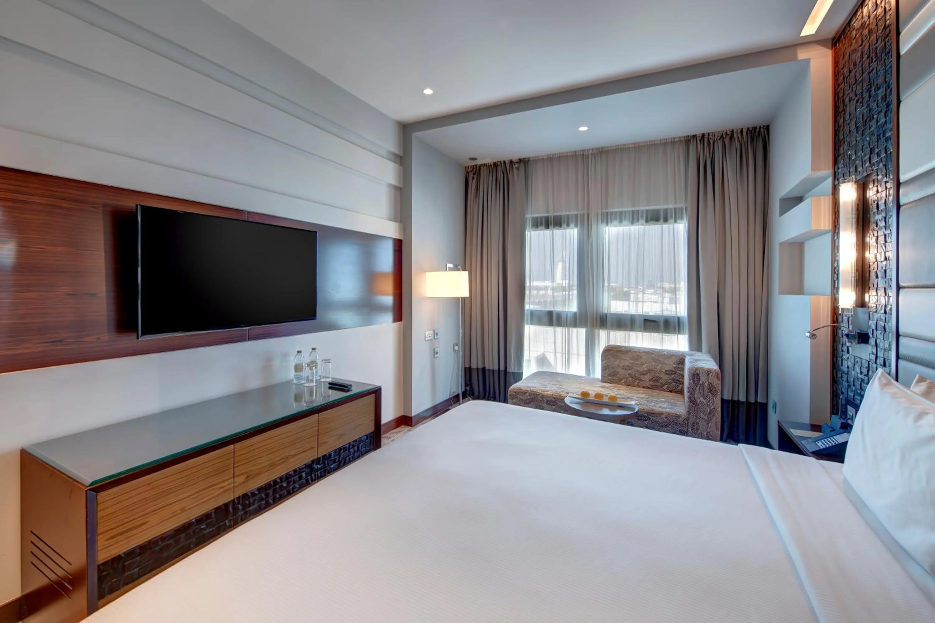 Bed in Metropolitan Hotel Dubai