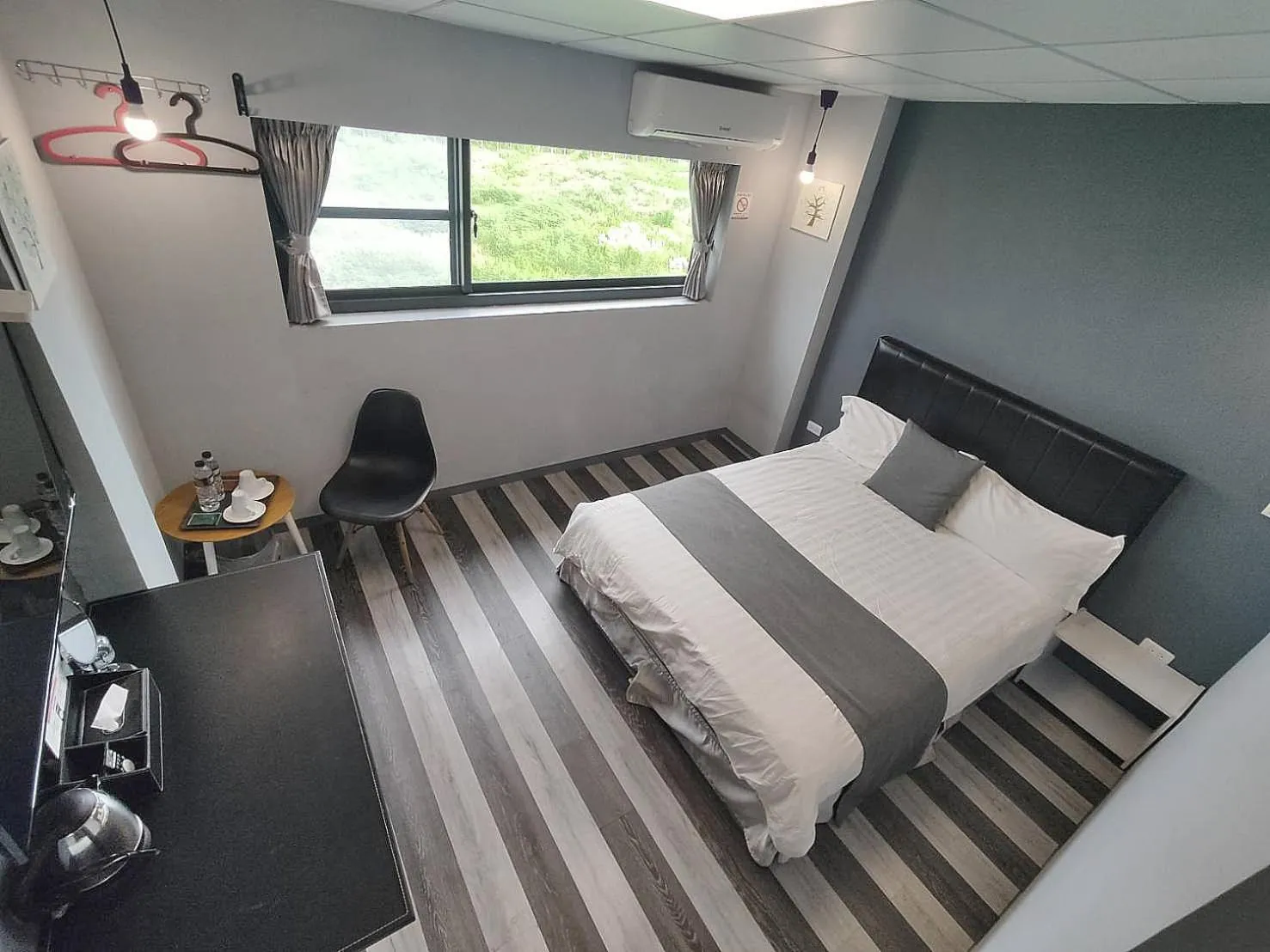 Photo of the whole room, Bed in Light Shadow