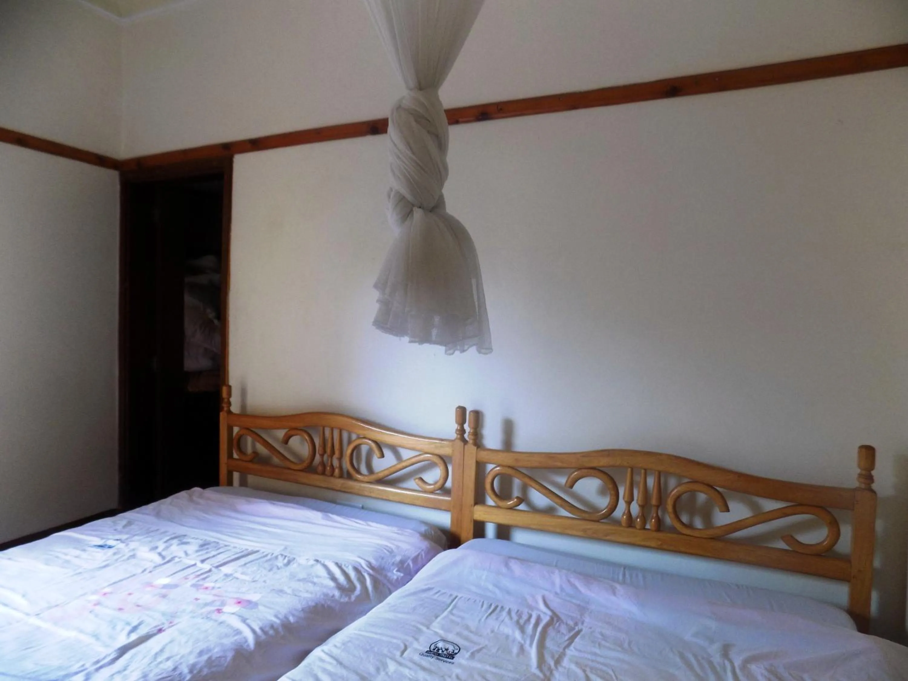 Bed in Rhino Motel Mbarara