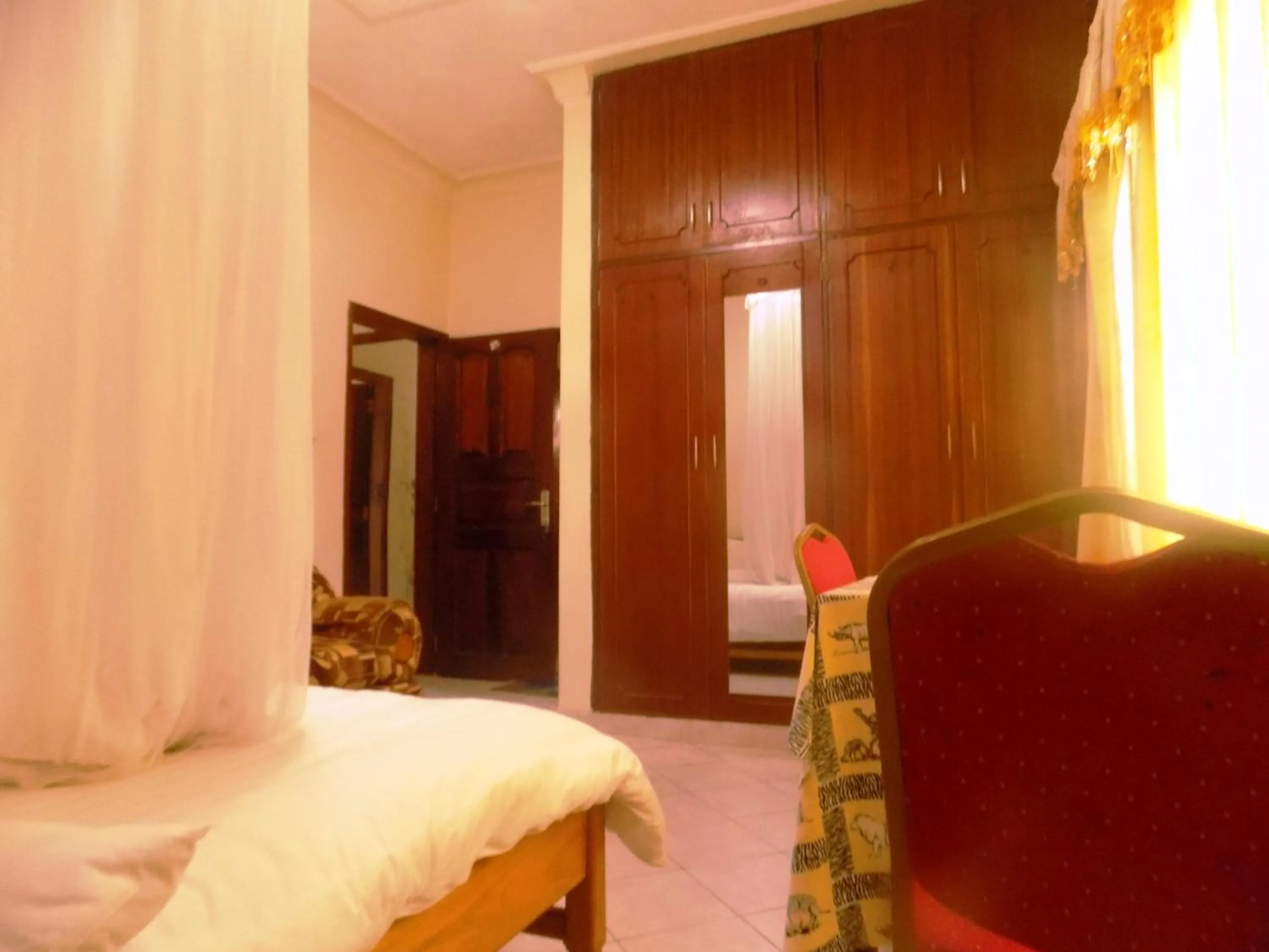Bed in Rhino Motel Mbarara