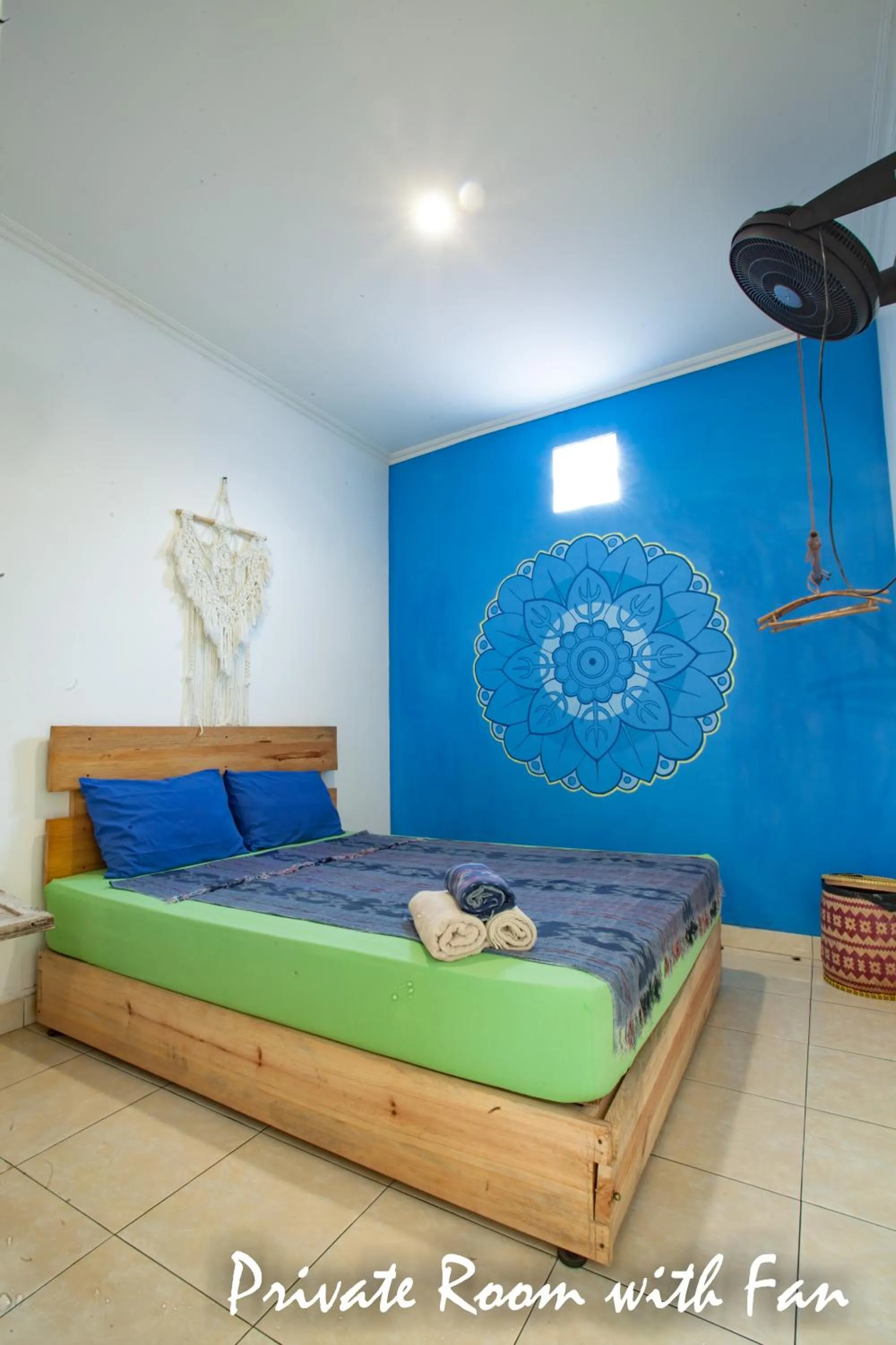 Bed in Happy Buddha Yogyakarta